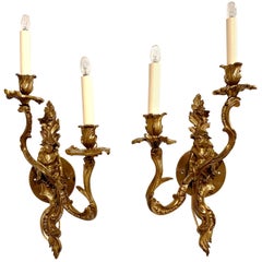 Pair of 19th Century French Louis XV Patinated Bronze Two-Light Wall Sconces