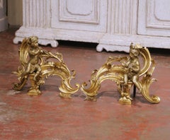 Coppia di Chenet francesi del XIX secolo in stile Luigi XV in bronzo con putti musicali