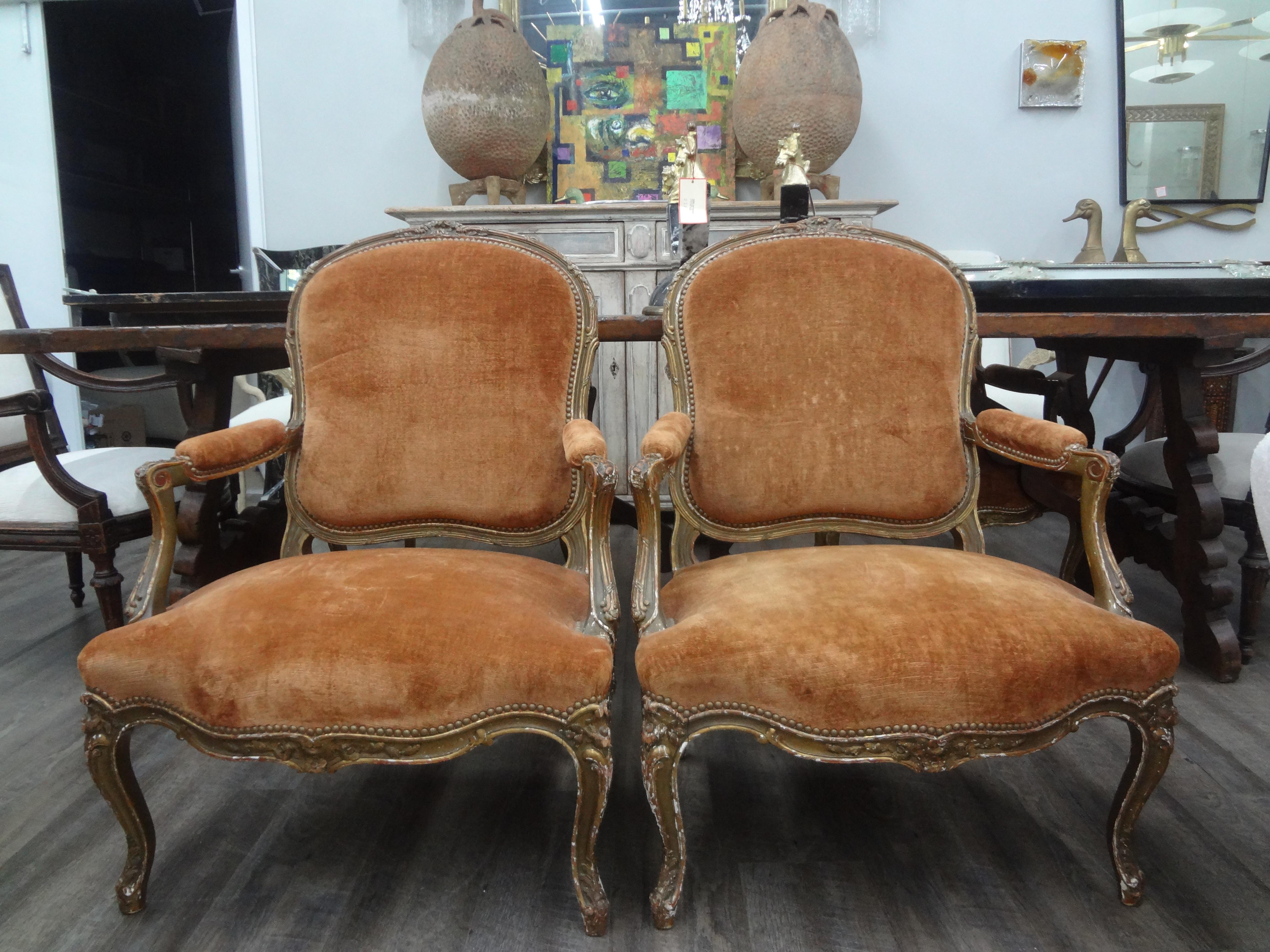 Pair Of 19th century French Louis XV Style Giltwood Chairs.
This large pair of Louis Delanois inspired antique French Louis XV style chairs, armchairs, side chairs or fauteuils have a lovely aged patina to the gilt finish and are ready for your new