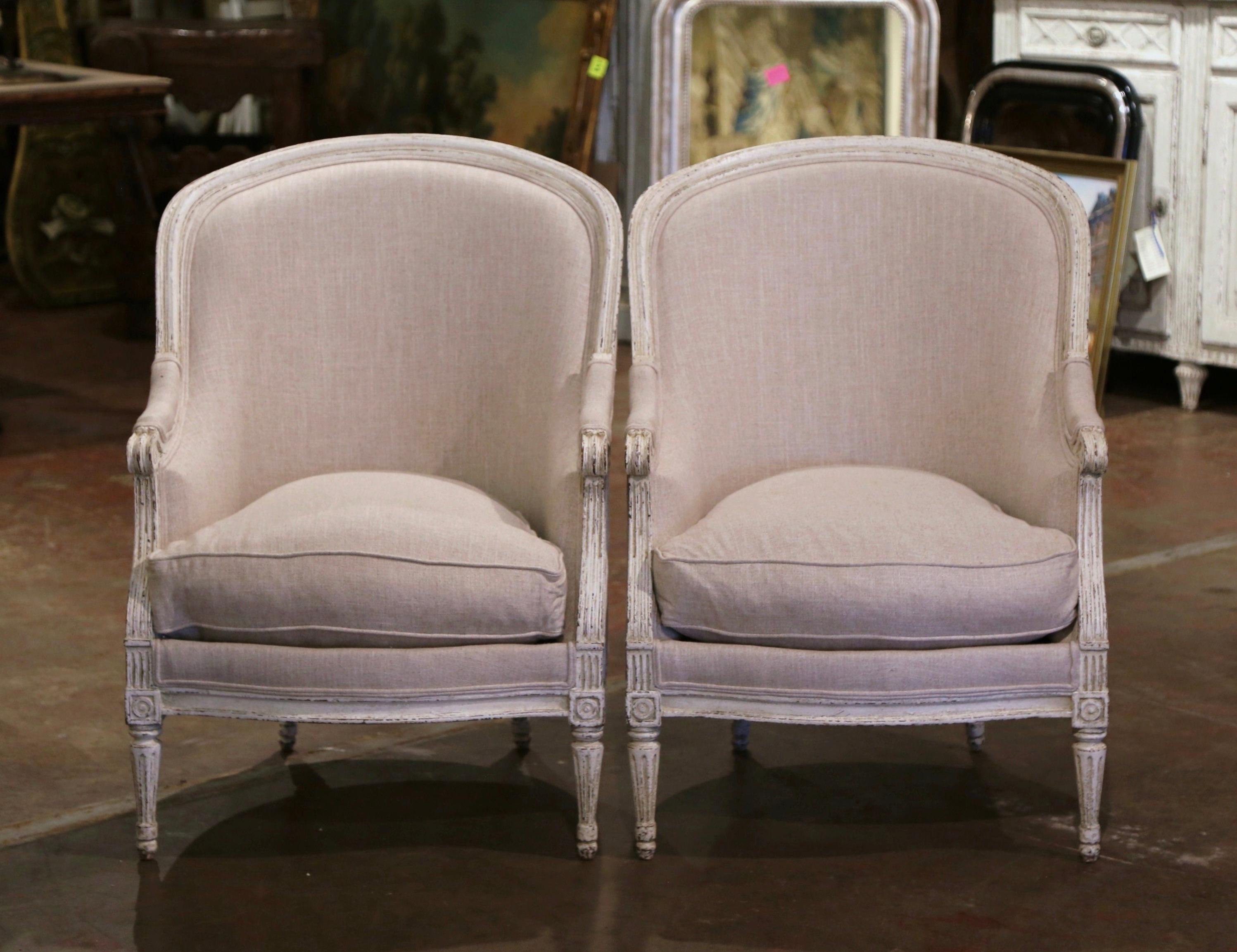 Decorate an office or a study with this elegant pair of antique fauteuils; crafted in France circa 1880, the 