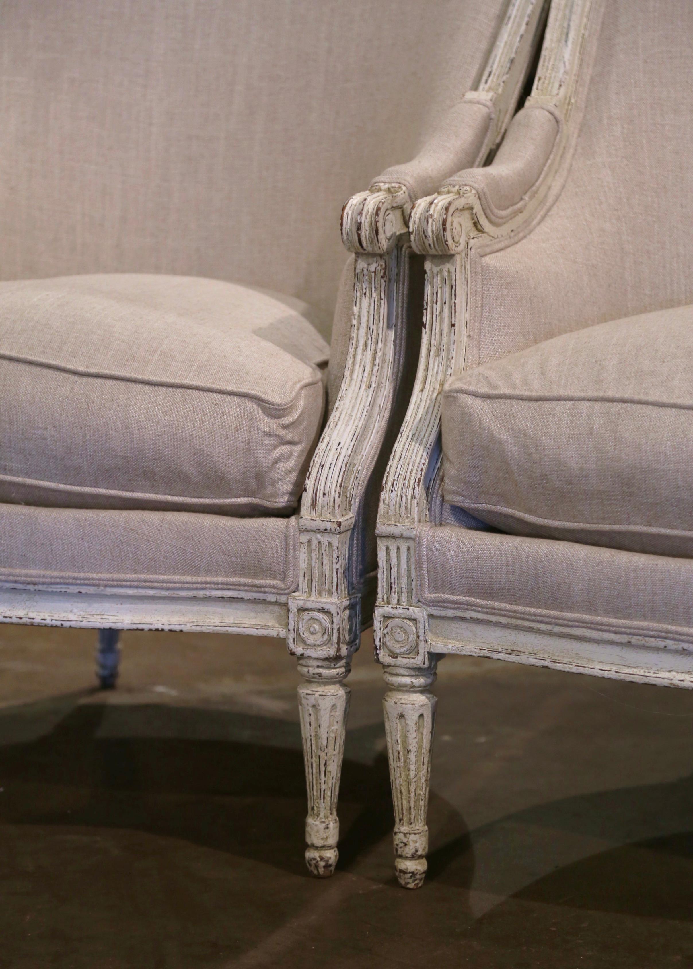 Hand-Carved Pair of 19th Century French Louis XVI Carved and Painted Upholstered Armchairs For Sale