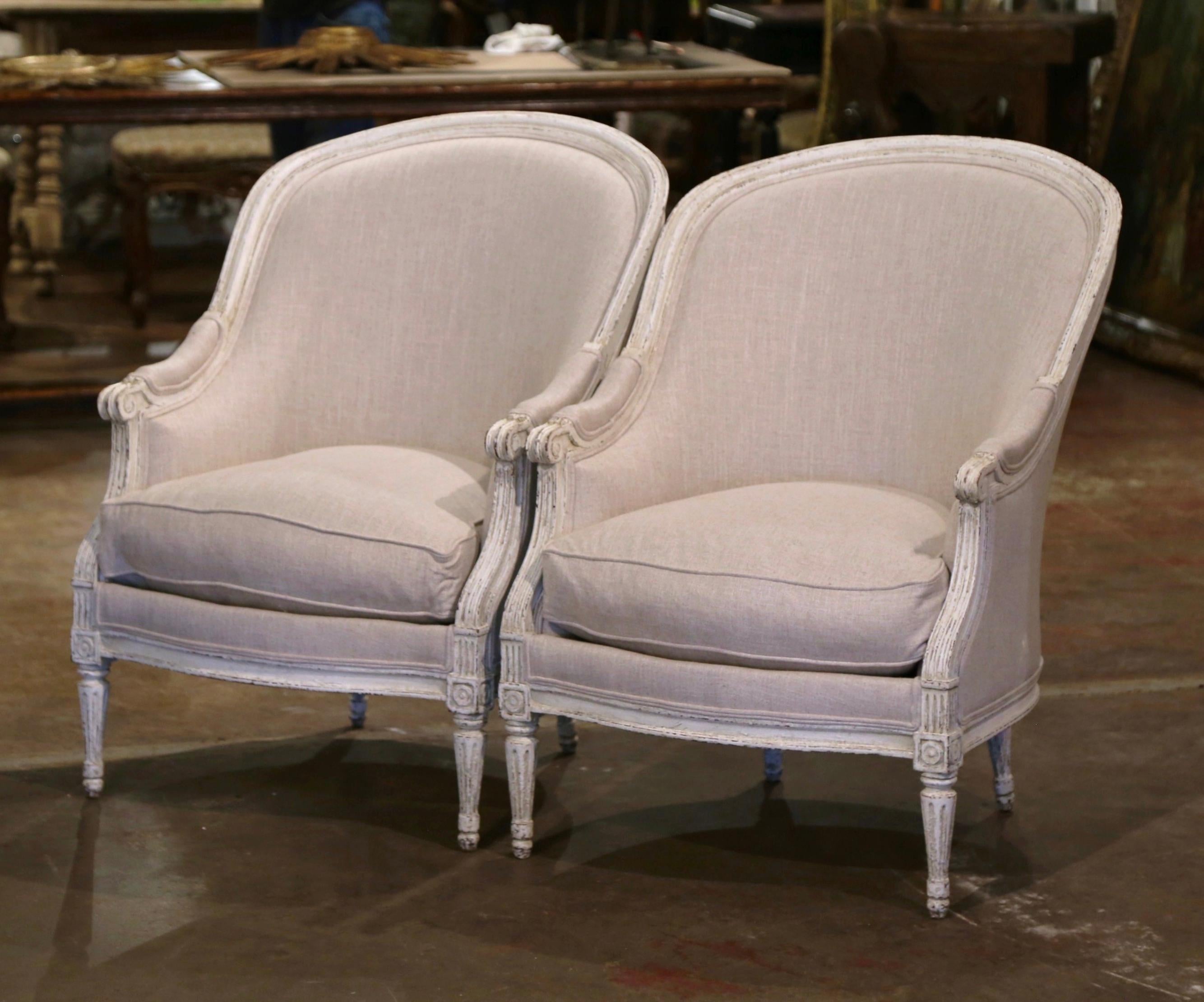 Fabric Pair of 19th Century French Louis XVI Carved and Painted Upholstered Armchairs For Sale
