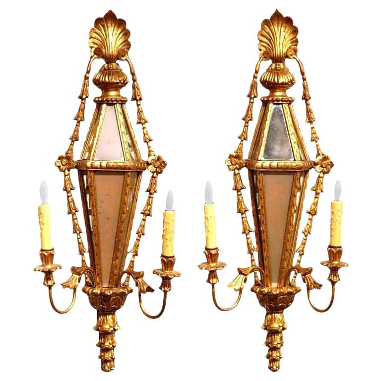 Pair of 19th Century French Louis XVI Carved Giltwood and Mirrored Wall Sconces For Sale