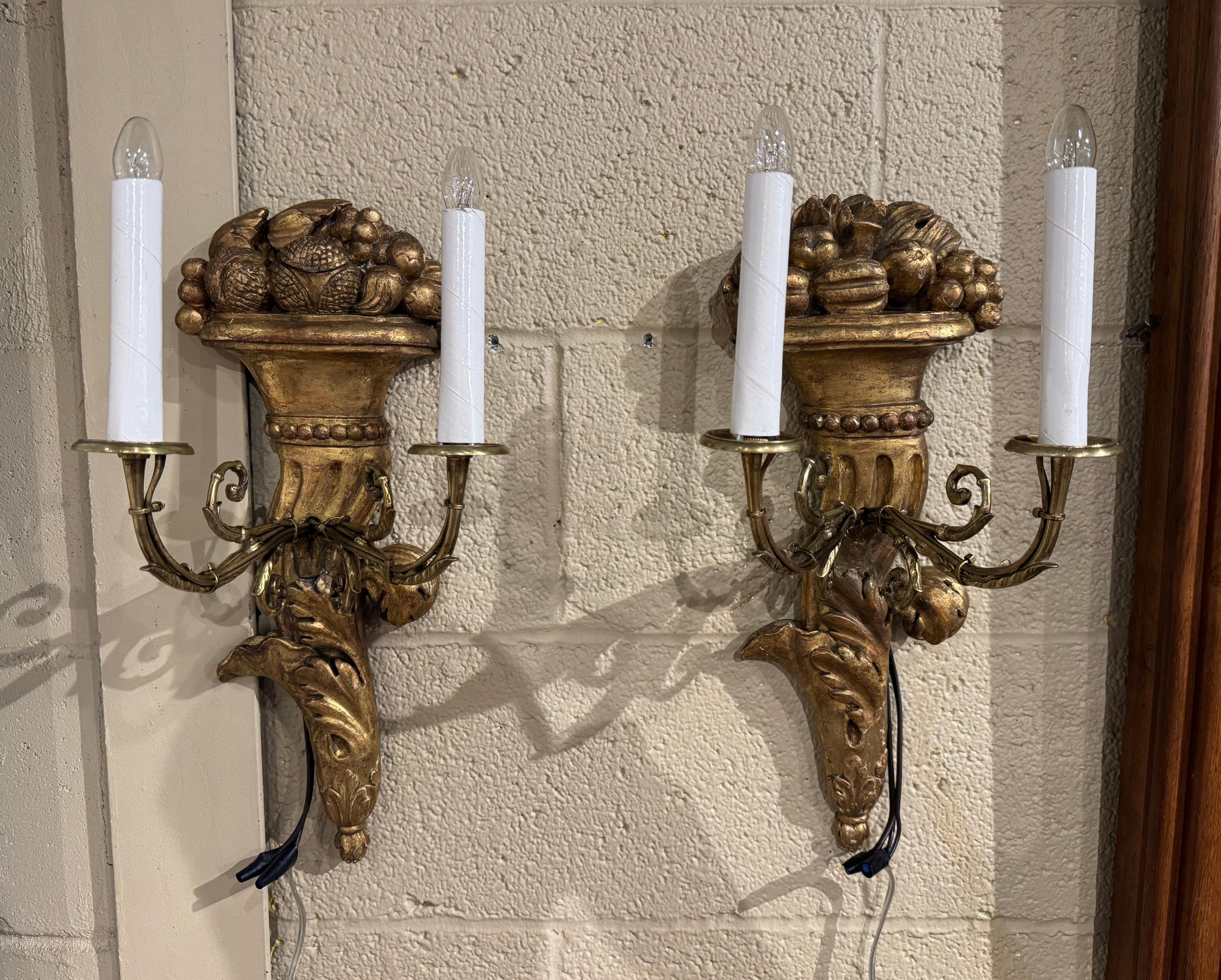 Pair of 19th Century French Louis XVI Carved Giltwood Two-Light Wall Sconces For Sale 1