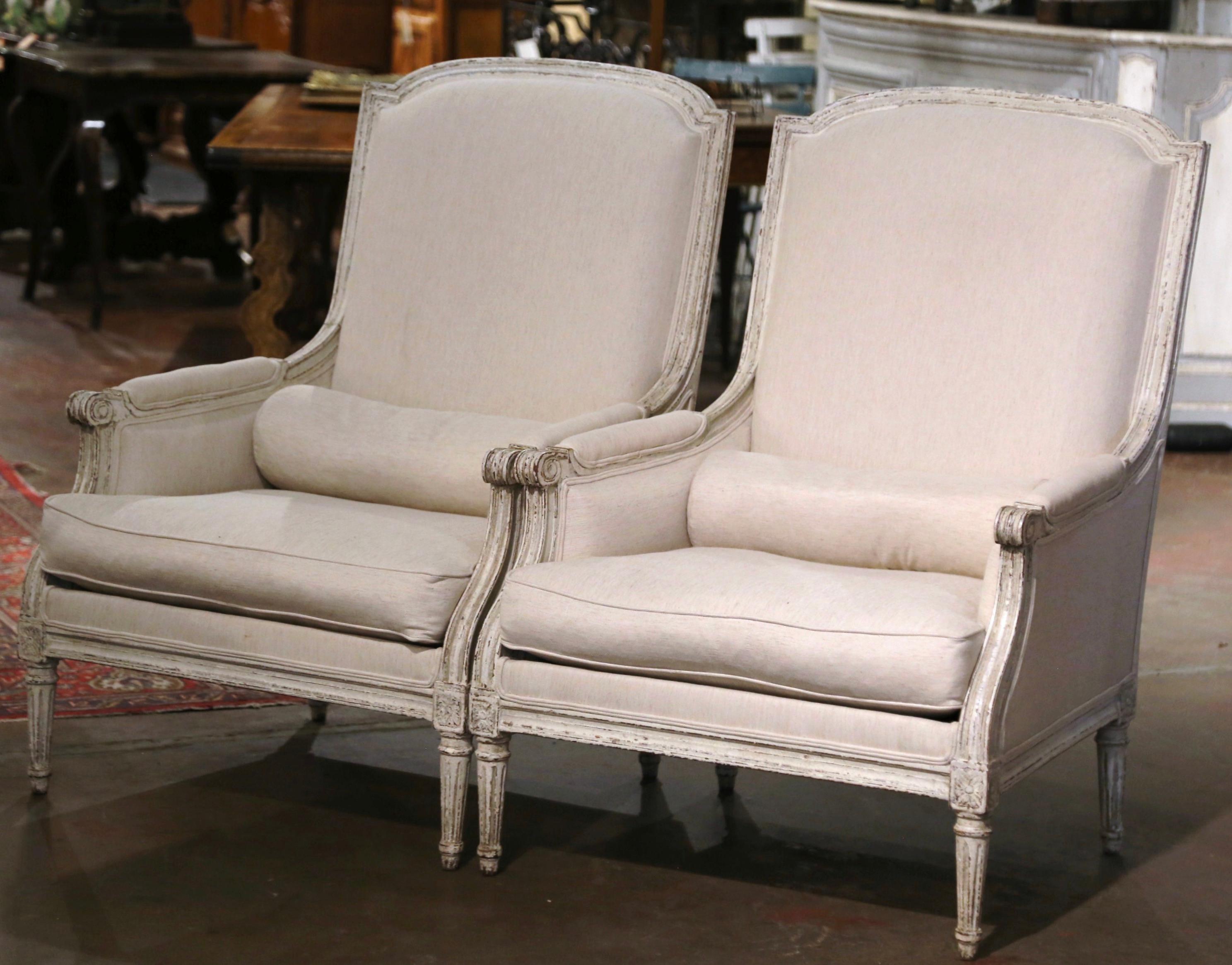 Fabric Pair of 19th Century French Louis XVI Carved Painted Upholstered Armchairs