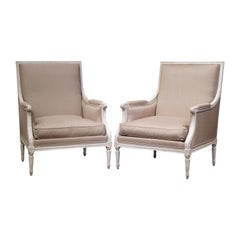 Pair of 19th Century French Louis XVI Carved Painted Upholstered Armchairs