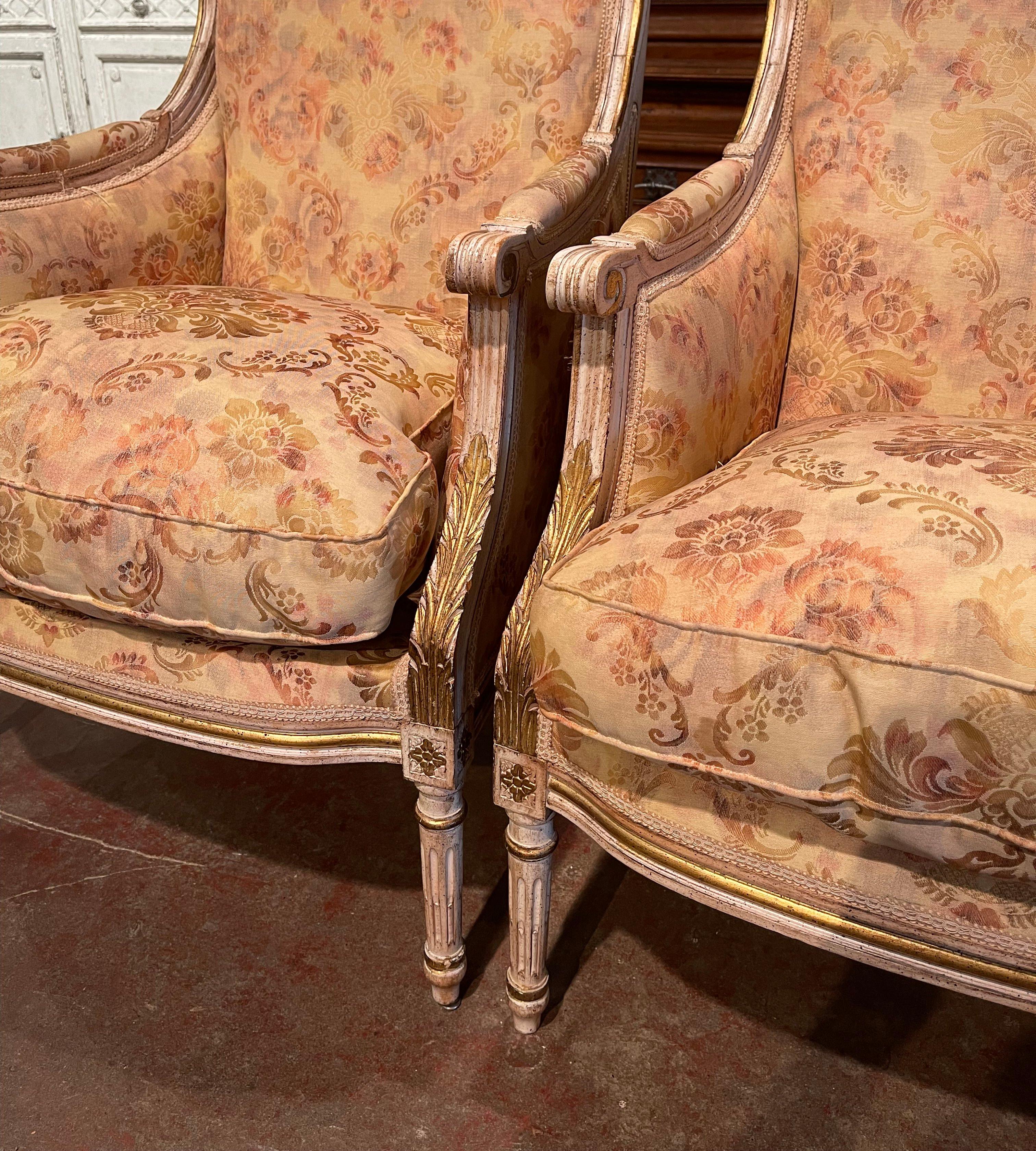 Pair of 19th Century French Louis XVI Carved Painted with Parcel Gilt Armchairs In Excellent Condition In Dallas, TX
