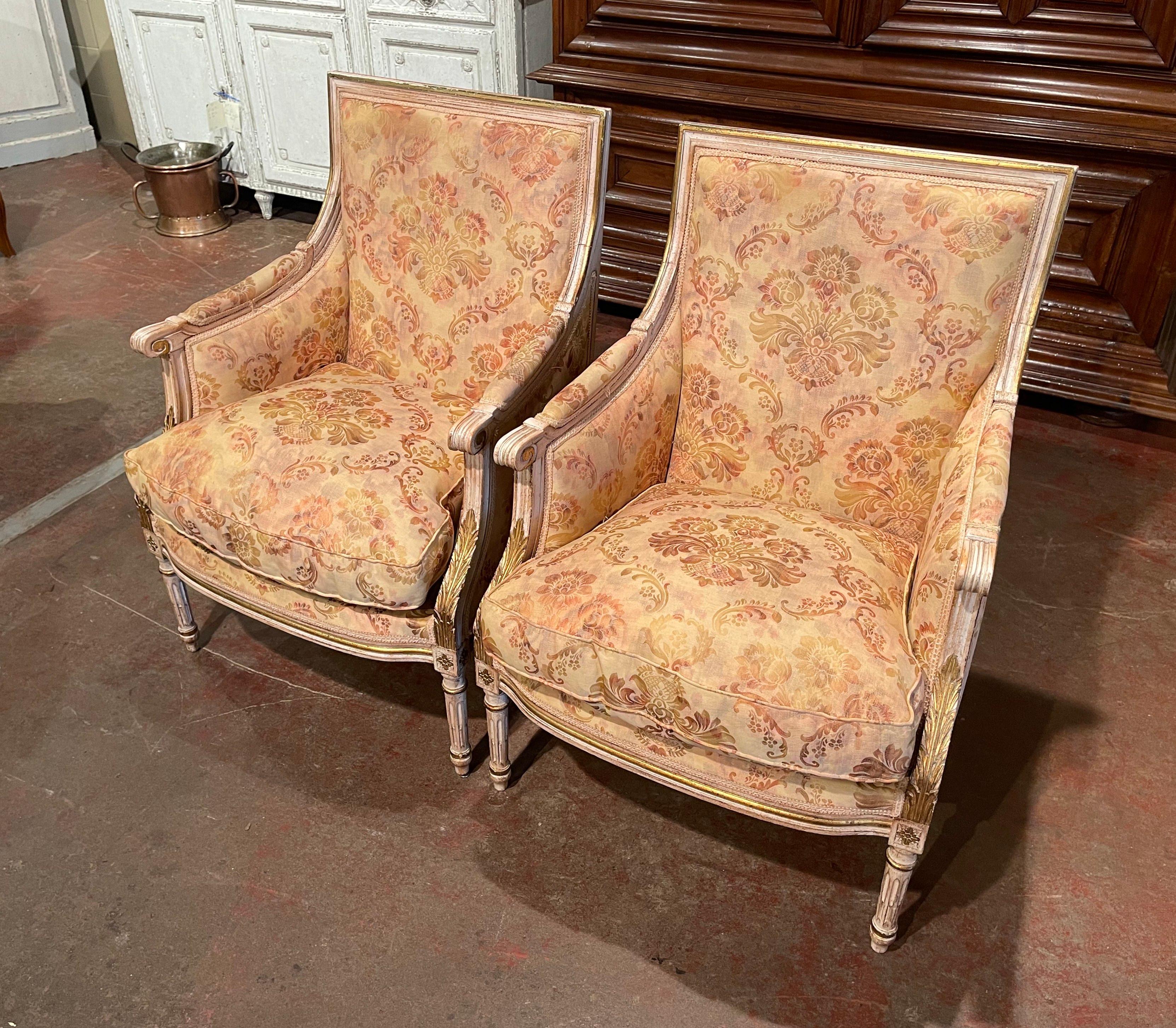 Fabric Pair of 19th Century French Louis XVI Carved Painted with Parcel Gilt Armchairs
