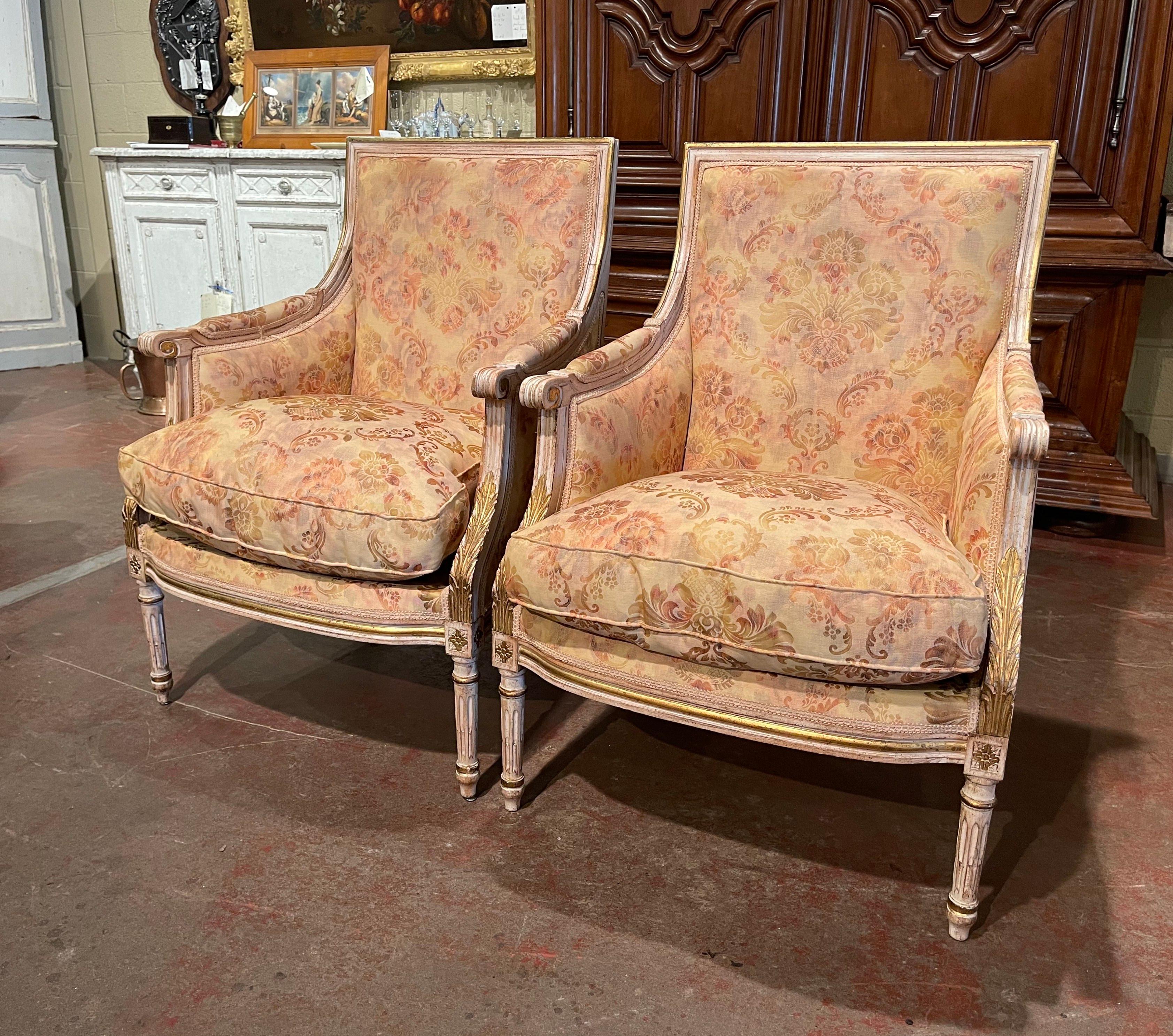 Pair of 19th Century French Louis XVI Carved Painted with Parcel Gilt Armchairs 1