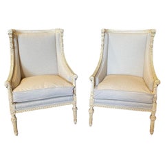 Pair of 19th Century French Louis XVI Carved Winged Armchairs or Bergeres