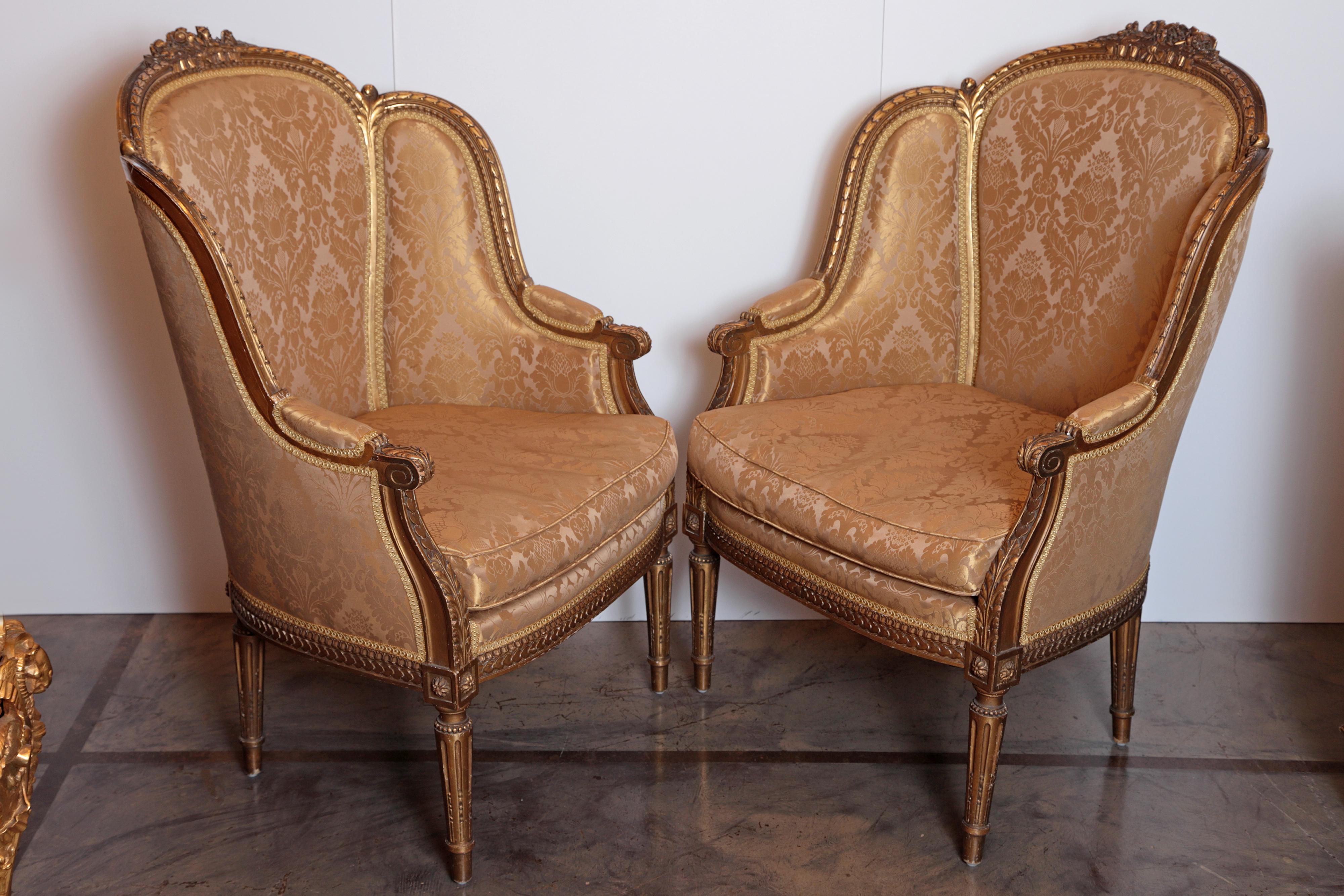 Pair of 19th century French finely carved gilt bergeres.