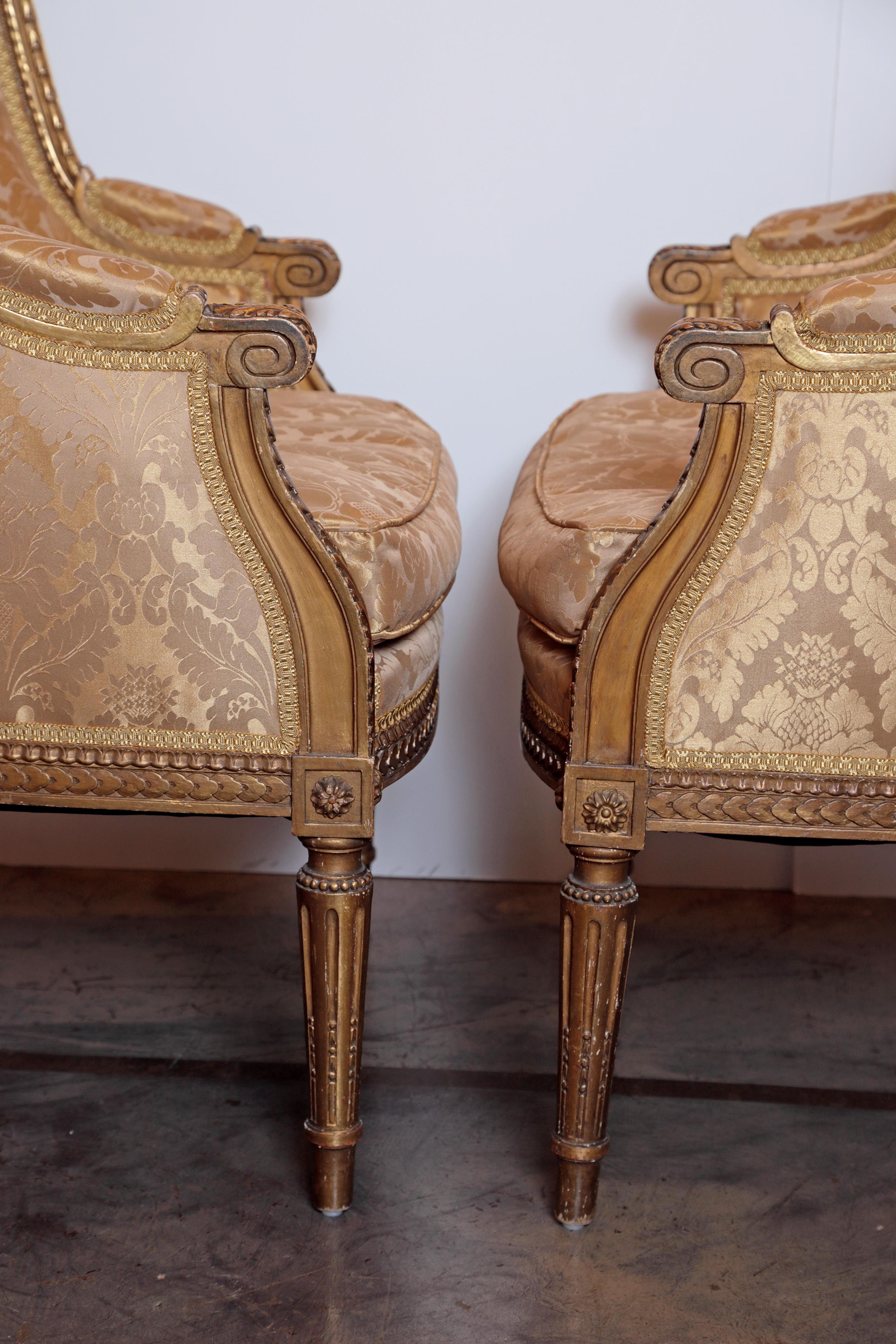 Pair of 19th Century French Louis XVI Gilt Carved Bergeres 1