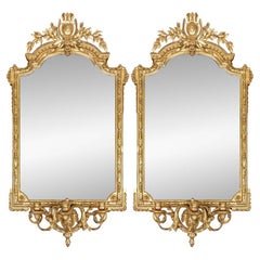 Pair Of 19th Century French Louis XVI Style Giltwood Mirrors With Candleabras