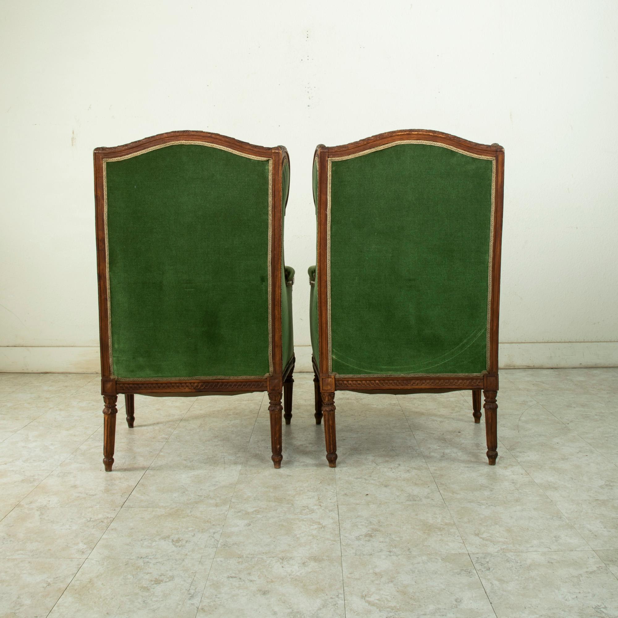 Pair of 19th Century French Louis XVI Style Walnut Wingback Armchairs, Bergeres In Good Condition In Fayetteville, AR
