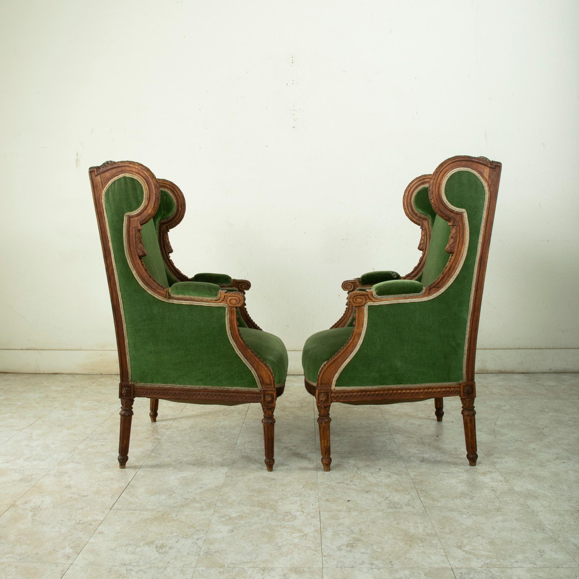 Mohair Pair of 19th Century French Louis XVI Style Walnut Wingback Armchairs, Bergeres