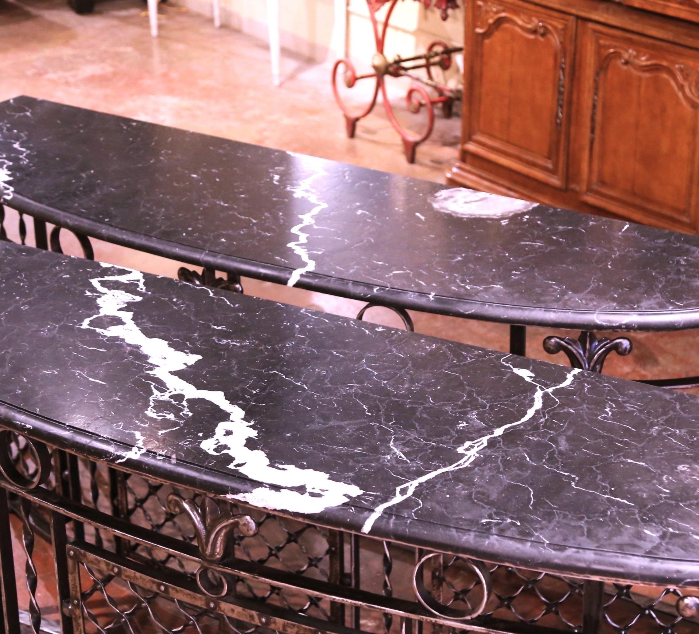 Forged Pair of 19th Century French Marble Top Polished Iron Bow Front Console Tables For Sale