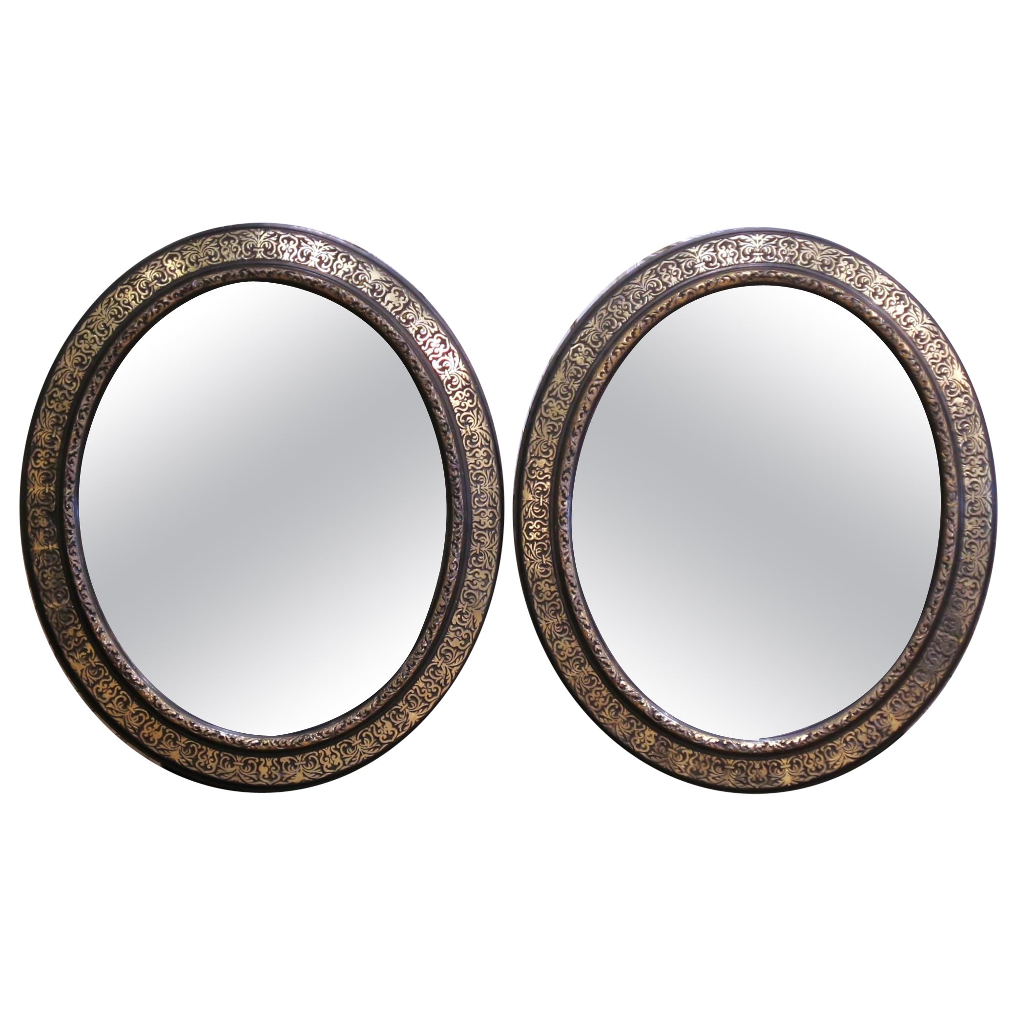 Pair of 19th Century French Napoleon III Black and Gold Oval Wall Mirrors