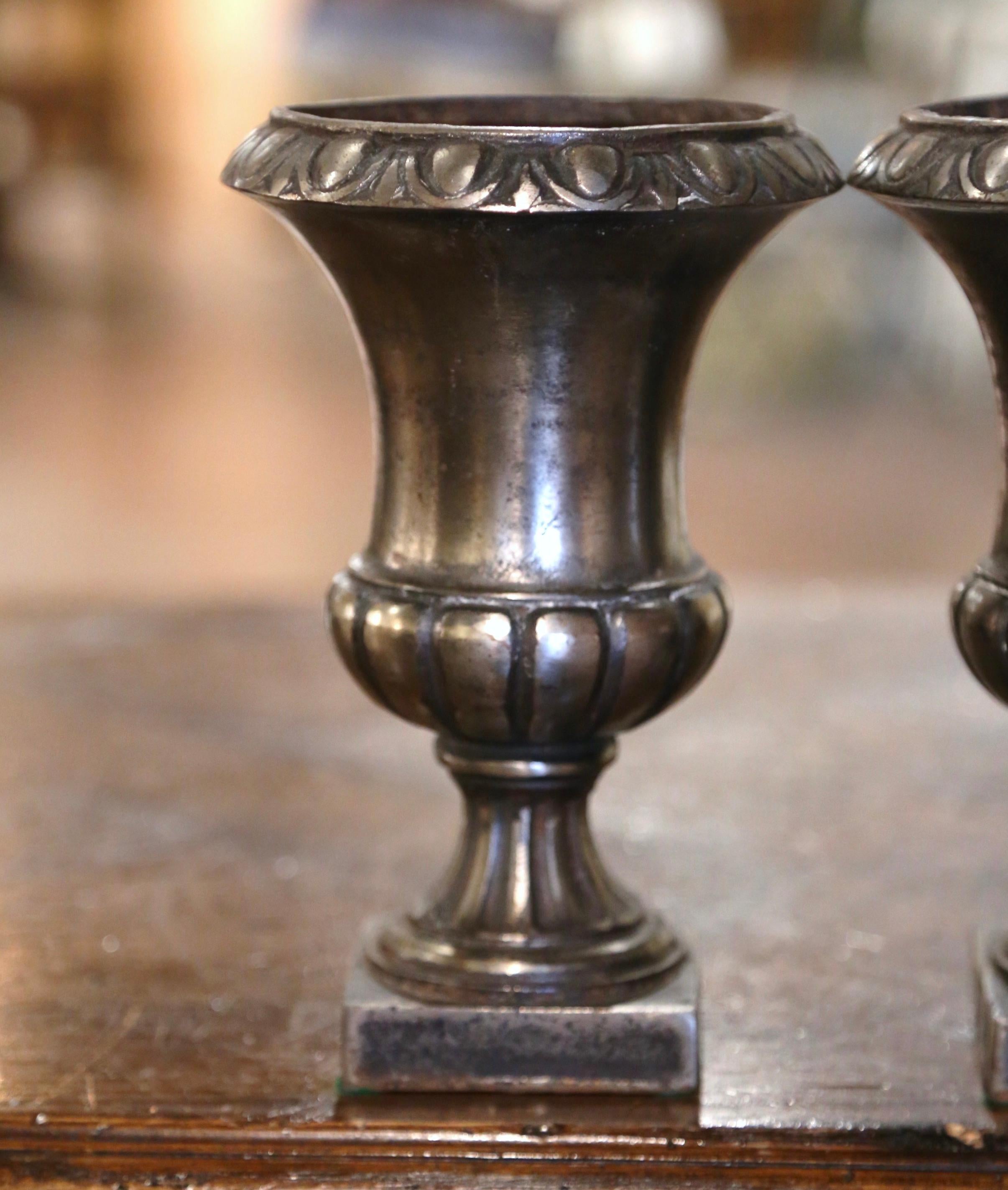 Hand-Crafted Pair of 19th Century French Neoclassical Polished Iron Campana Form Urns For Sale