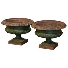 Pair of 19th Century French Neoclassical Weathered Iron Garden Urn Planters Pair of 19th Century French Neoclassical Weathered Iron Garden Urn Planters