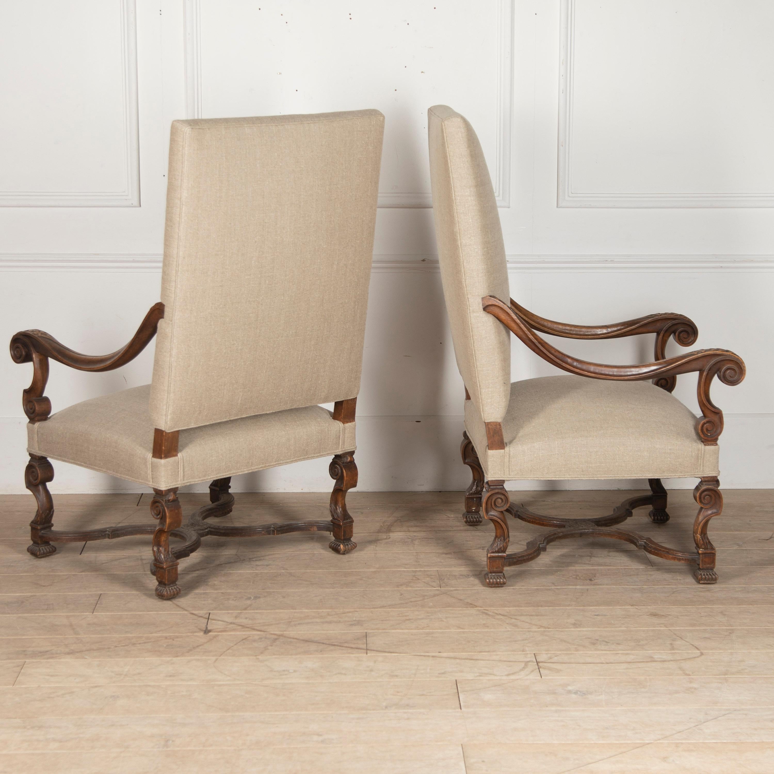 Fantastic pair of 19th century French armchairs in the style of thrones.

These armchairs embody the earlier 16th Century Baroque classical style with their elegant form. Featuring down-swept armrests and curved legs.

With wonderful all-over