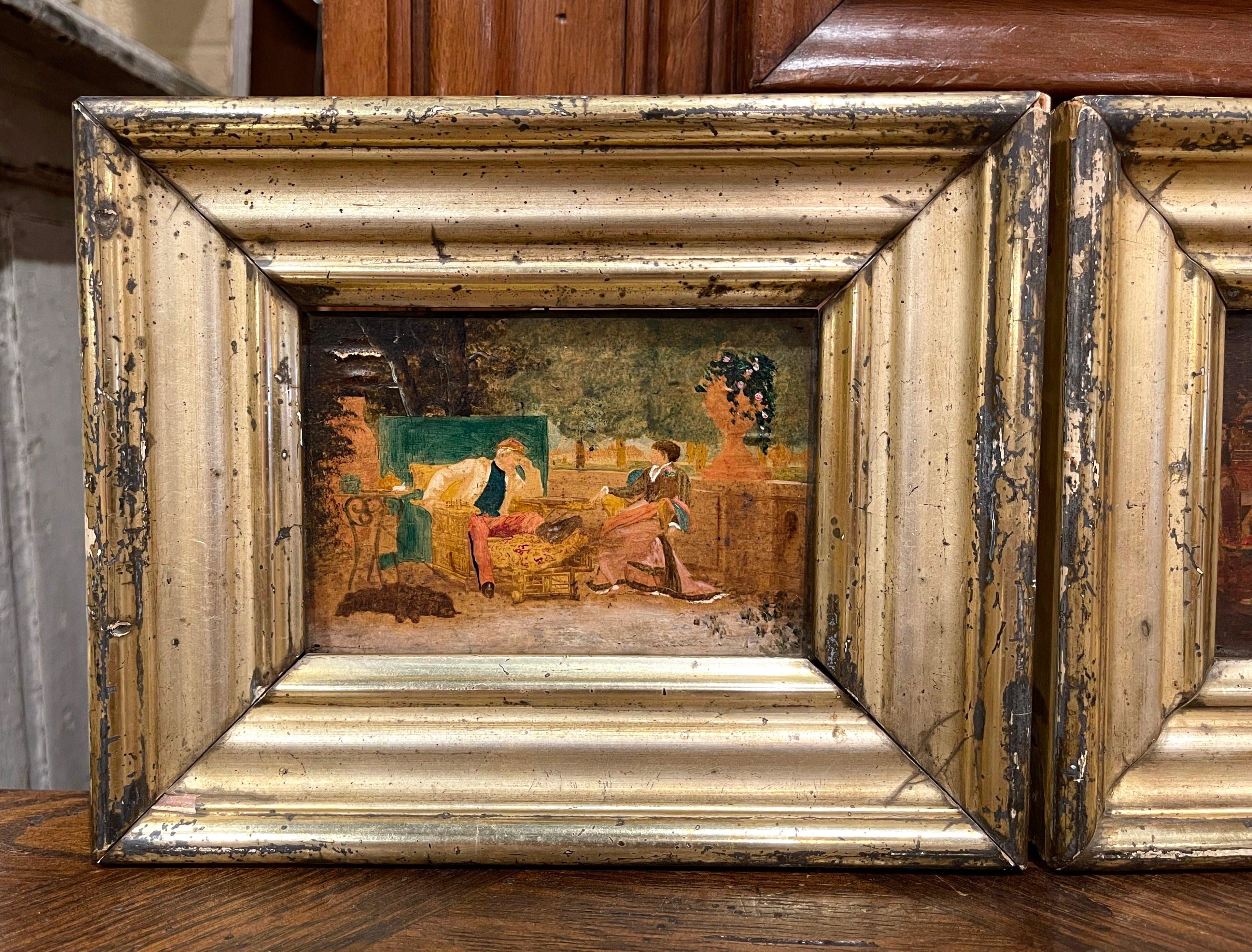These charming antique paintings were created in France, circa 1870. Set in the original gilt frames, both artworks are painted on board and depicts indoor scenes; a dinner setting with a butler serving the couple, and another with couple talking