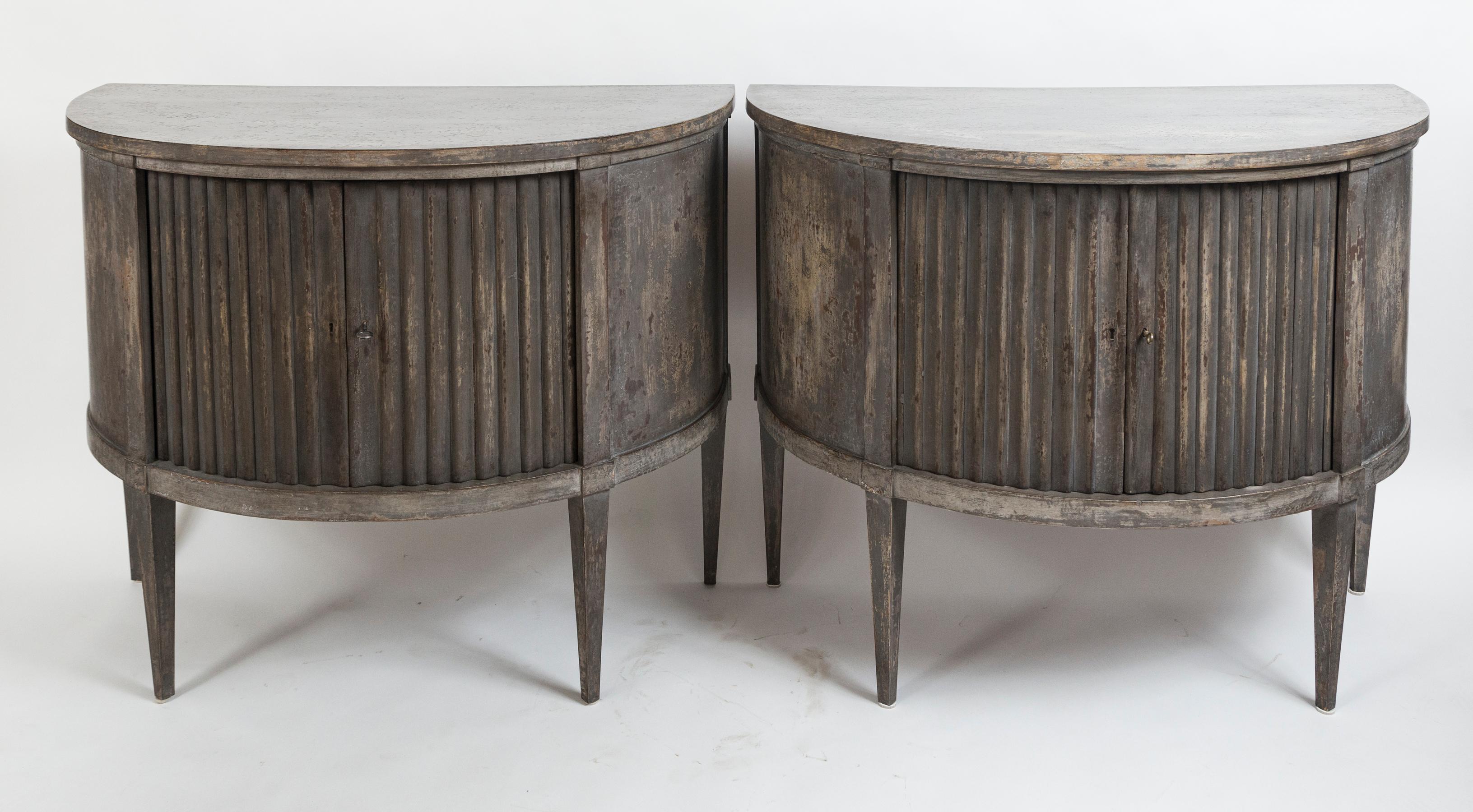 Pair of French painted demilune cabinets on high squared and tapered legs with louver doors
Note elegant proportions and finely patinated greige finish
Dating: 1880ca
Origin: France
Condition: Excellent restored condition and recently