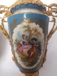 Pair of 19th Century French Painted Porcelain and Ormolu Lamps