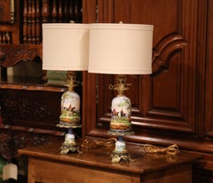 Pair of 19th Century French Painted Porcelain & Brass Oil Lamps with Hunt Scenes