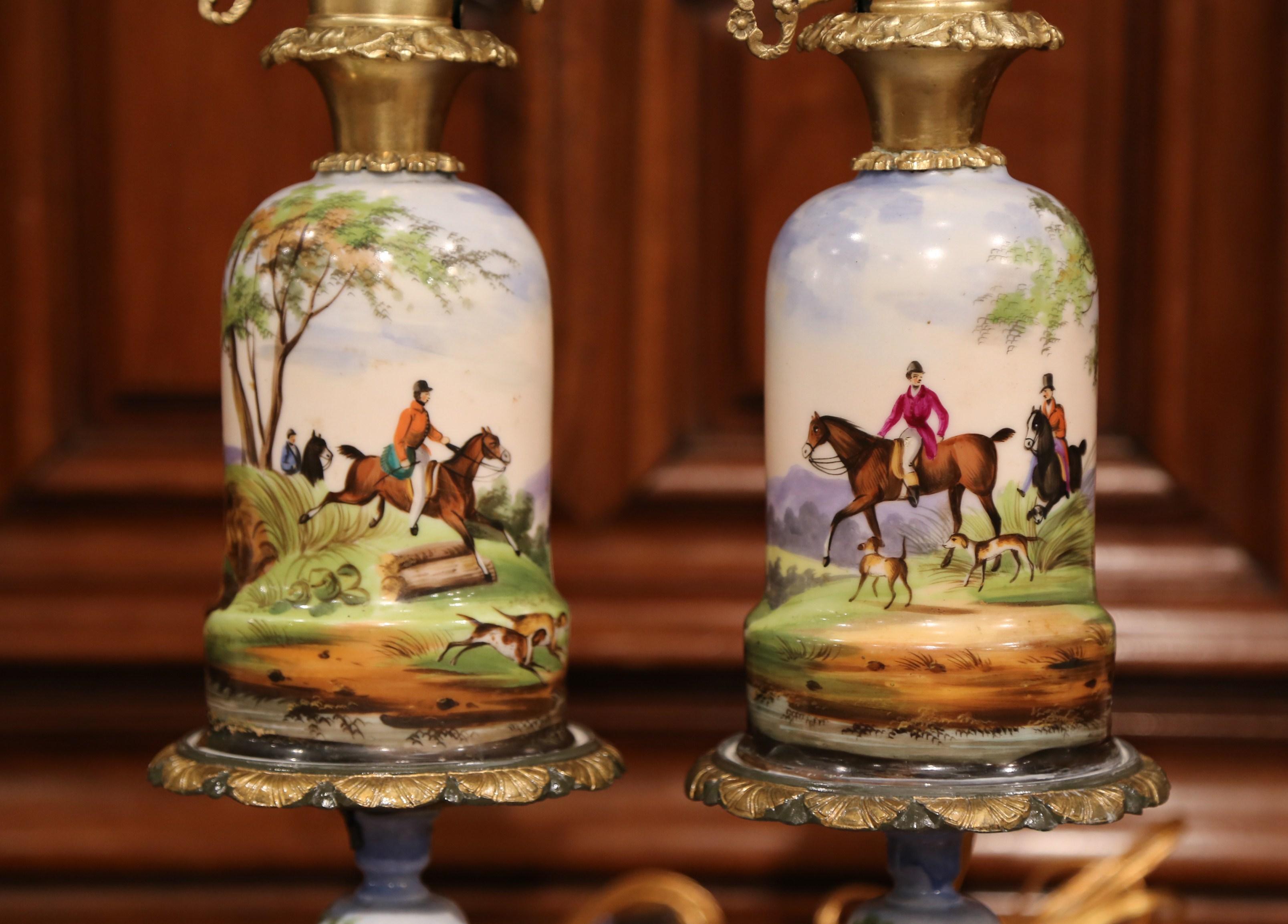 Hand-Painted Pair of 19th Century French Painted Porcelain & Brass Oil Lamps with Hunt Scenes