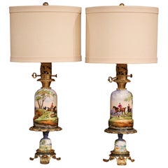 Pair of 19th Century French Painted Porcelain & Brass Oil Lamps with Hunt Scenes