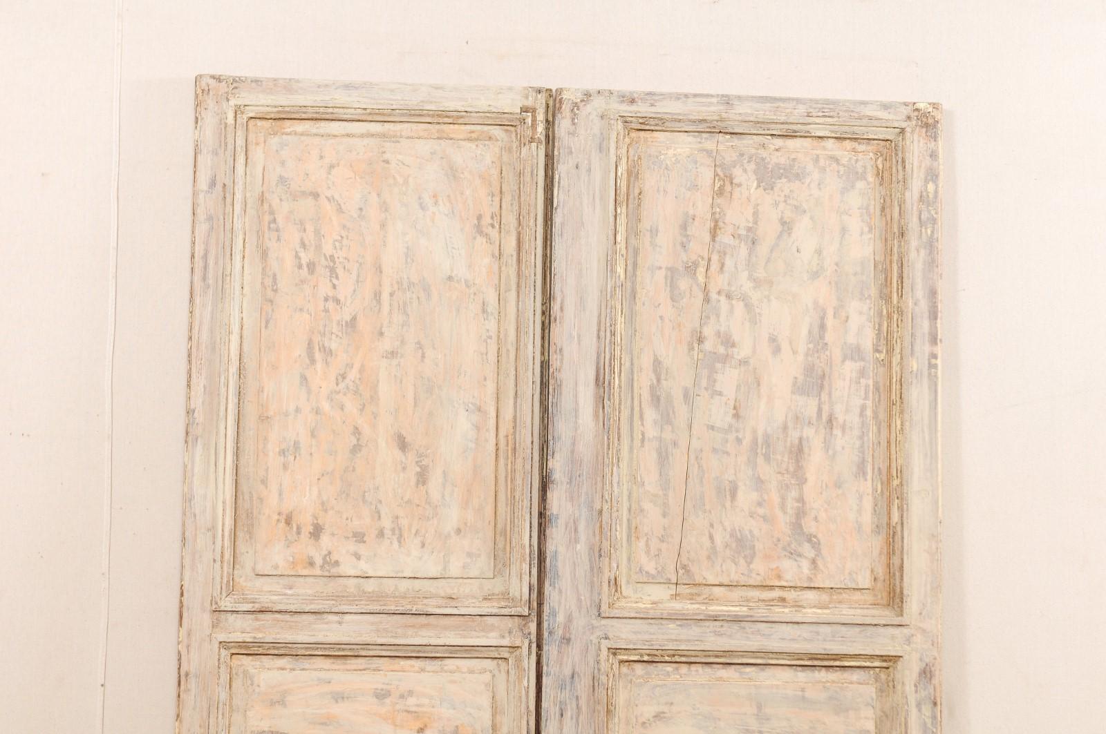 Pair of 19th Century French Painted Wood Doors with Lovely Cream Colored Finish In Good Condition In Atlanta, GA