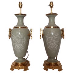 Pair of 19th Century French Pate Sur Pate Porcelain Lamps