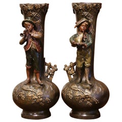 Pair of 19th Century French Patinated and Gilt Spelter Vases with Tyrolean Boys