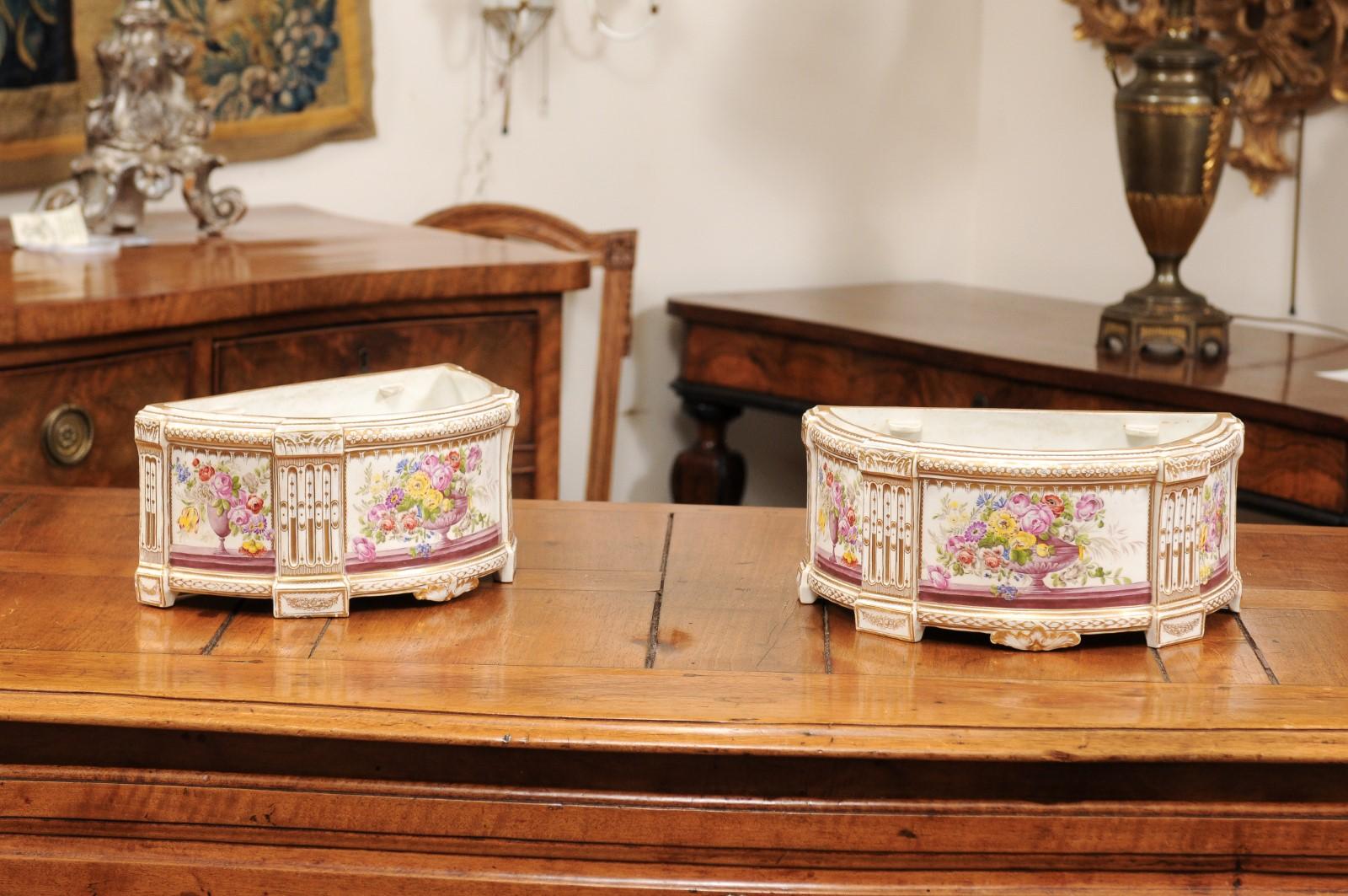 Pair of 19th century French Porcelain Bough Pots with Gilt Accents & Floral Design.