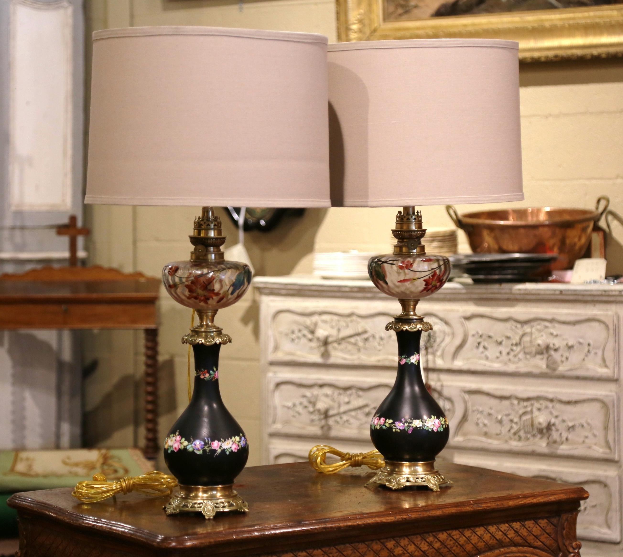 These elegant antique oil lamps made into table lights were crafted in France, circa 1880. The tall 