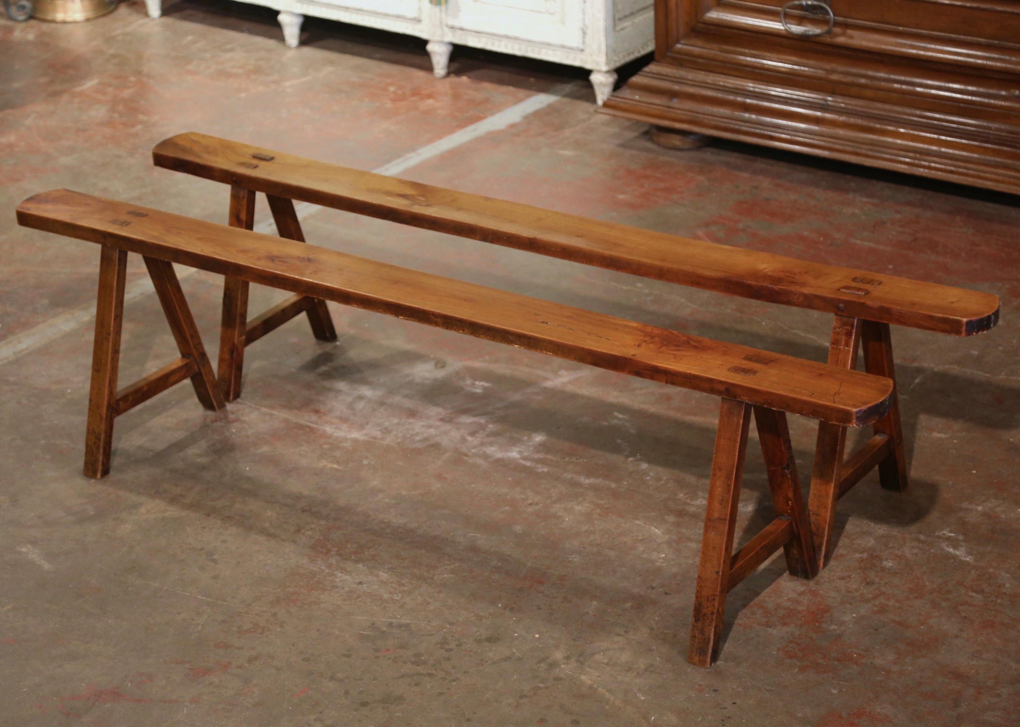 Hand-Carved Pair of 19th Century French Provincial Carved Cherry Benches on Trestle Bases