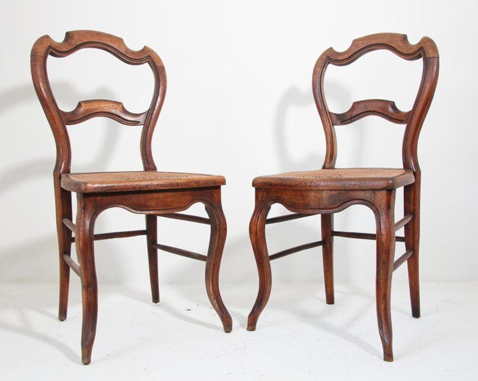 Hand-Crafted Pair of 19th Century French Provincial Walnut Caned Chairs For Sale