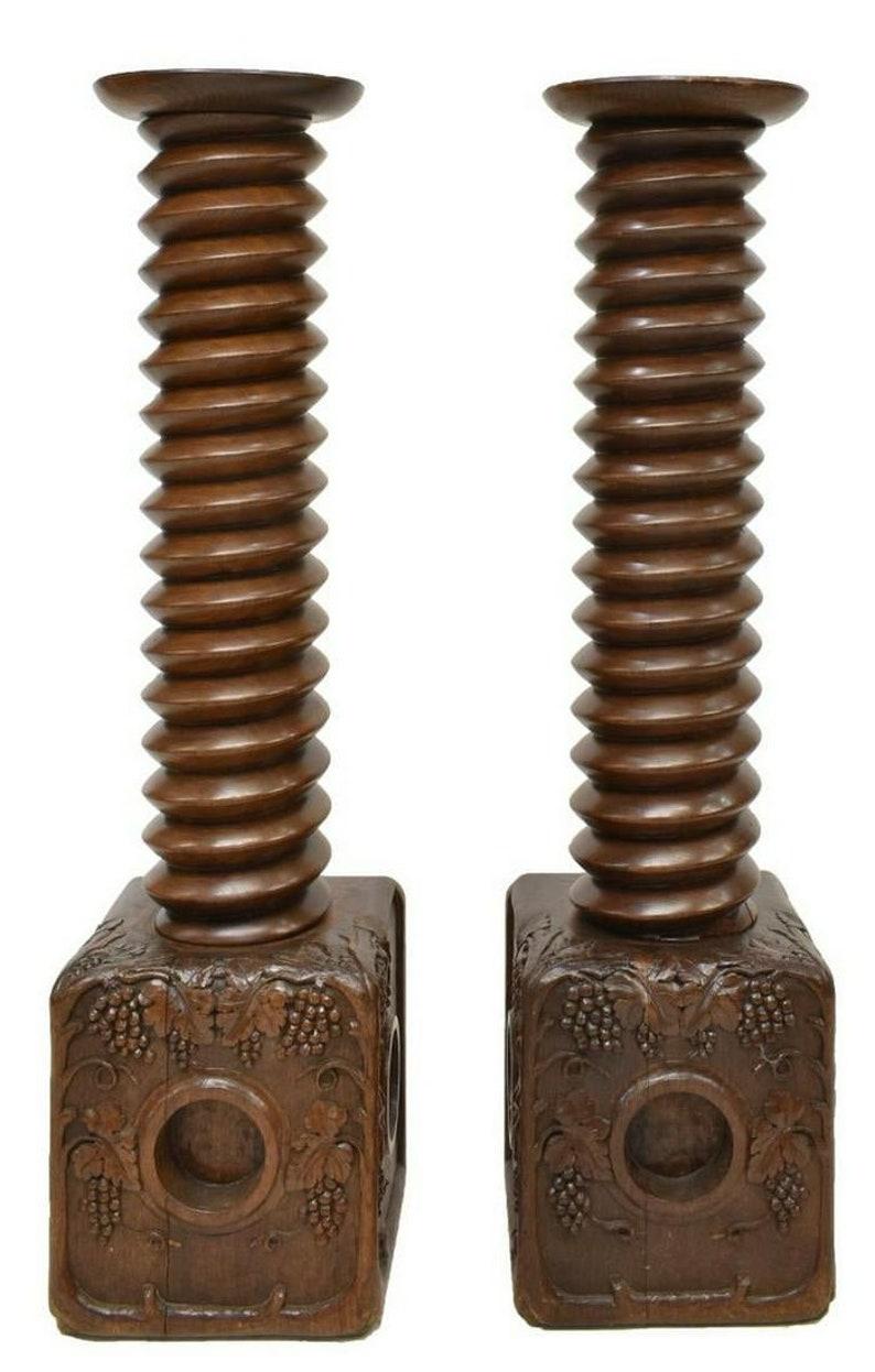 A most impressive pair of 19th century industrial French Provincial vineyard wine-press screw elements, refinished and fashioned as monumental pedestals / decorative arts stand / folk art sculptures. France; circa 1860s/1870s

Over 150 years ago at