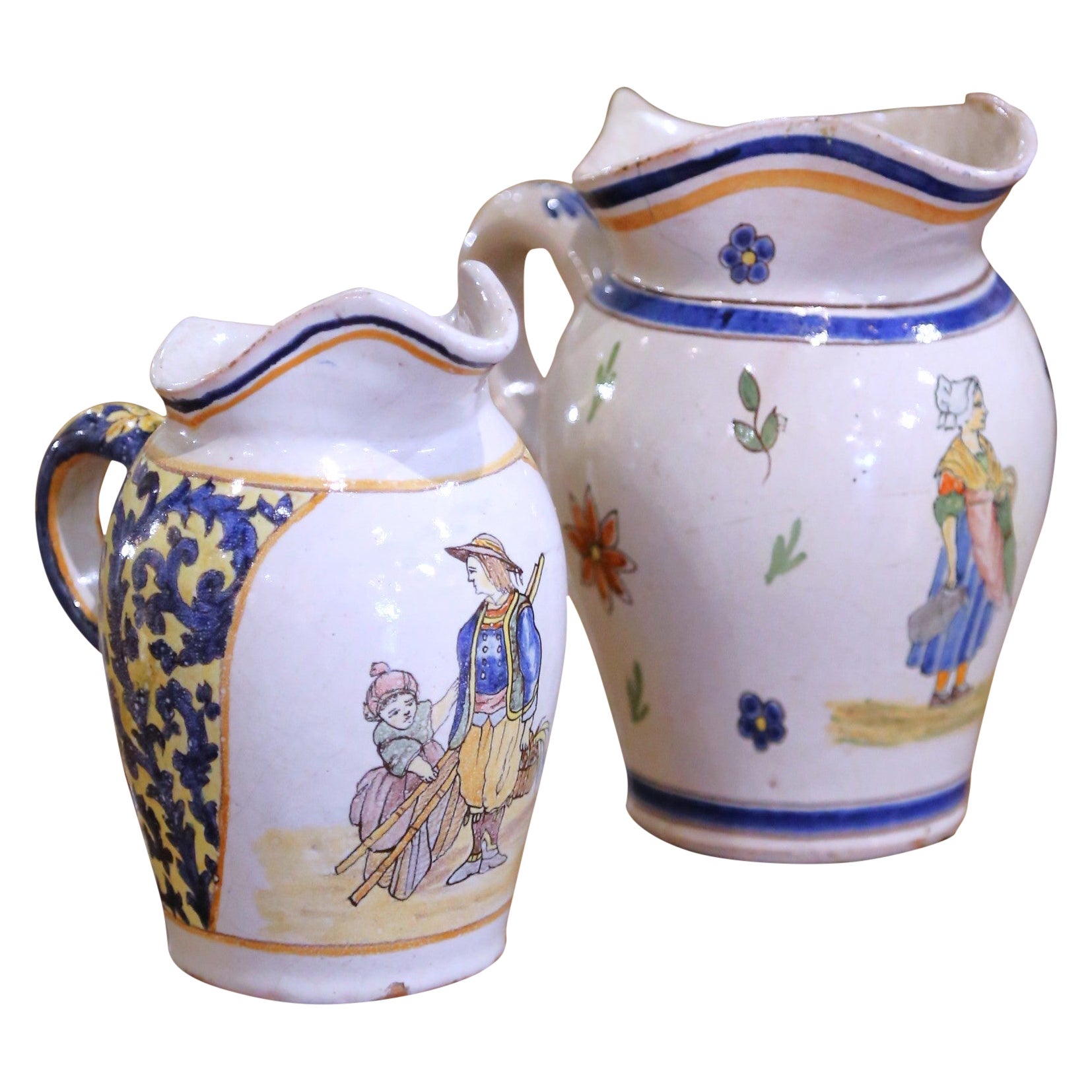 Pair of 19th Century French Quimper Faience Jugs with Breton Figures and Floral For Sale
