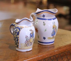 Pair of 19th Century French Quimper Faience Jugs with Breton Figures and Floral