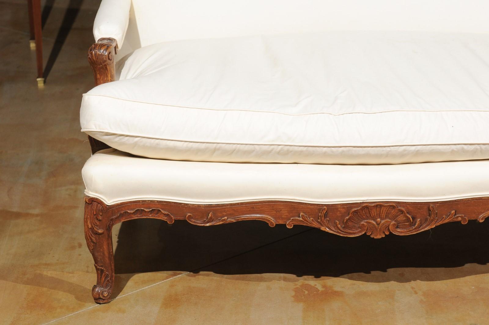 Pair of 19th Century French Régence Style Upholstered Canapés with Cabriole Legs 10