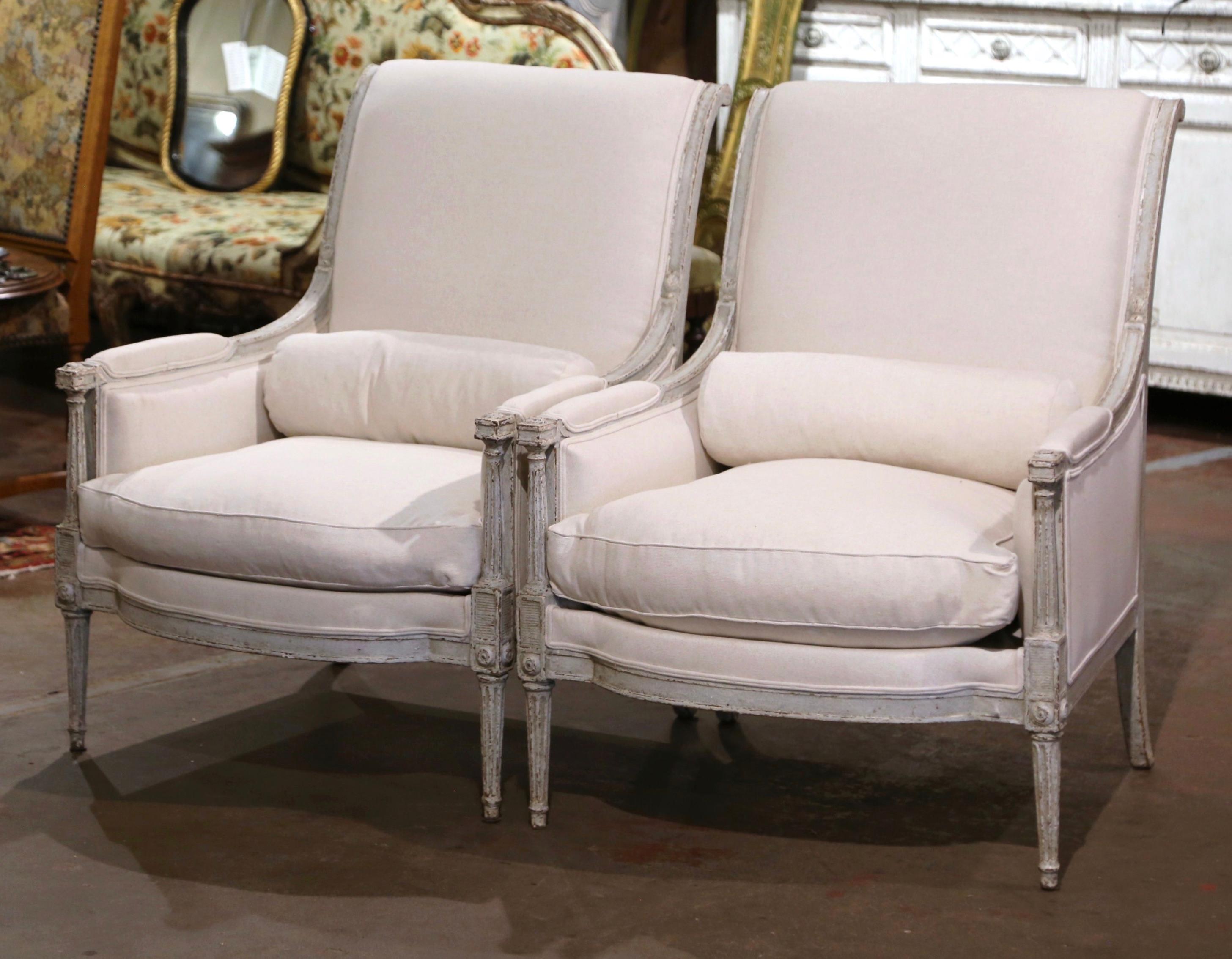 Fabric Pair of 19th Century French Restauration Carved Painted Upholstered Armchairs