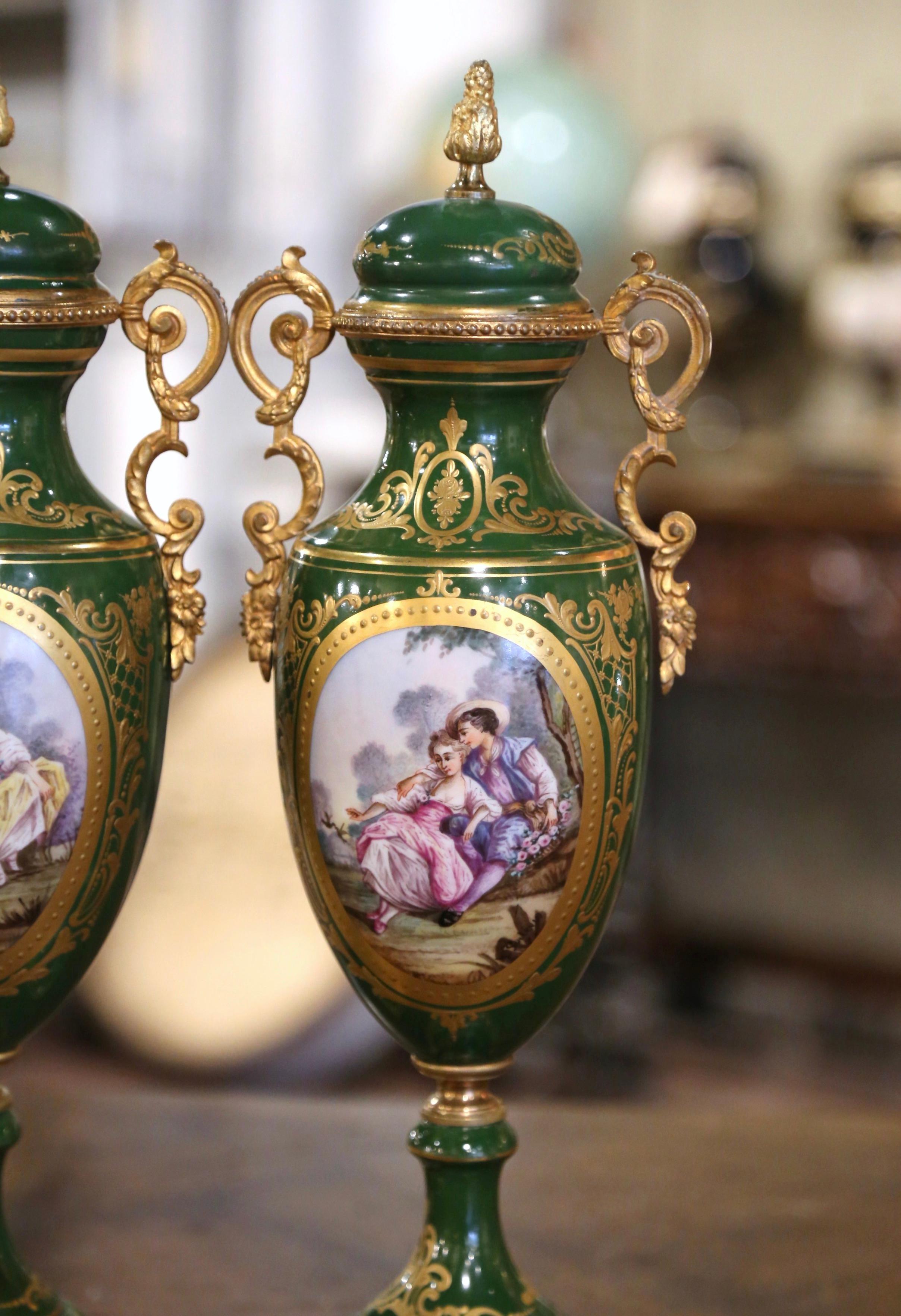 Pair of 19th Century French Sevres Gilt Metal and Painted Porcelain Covered Urns For Sale 1
