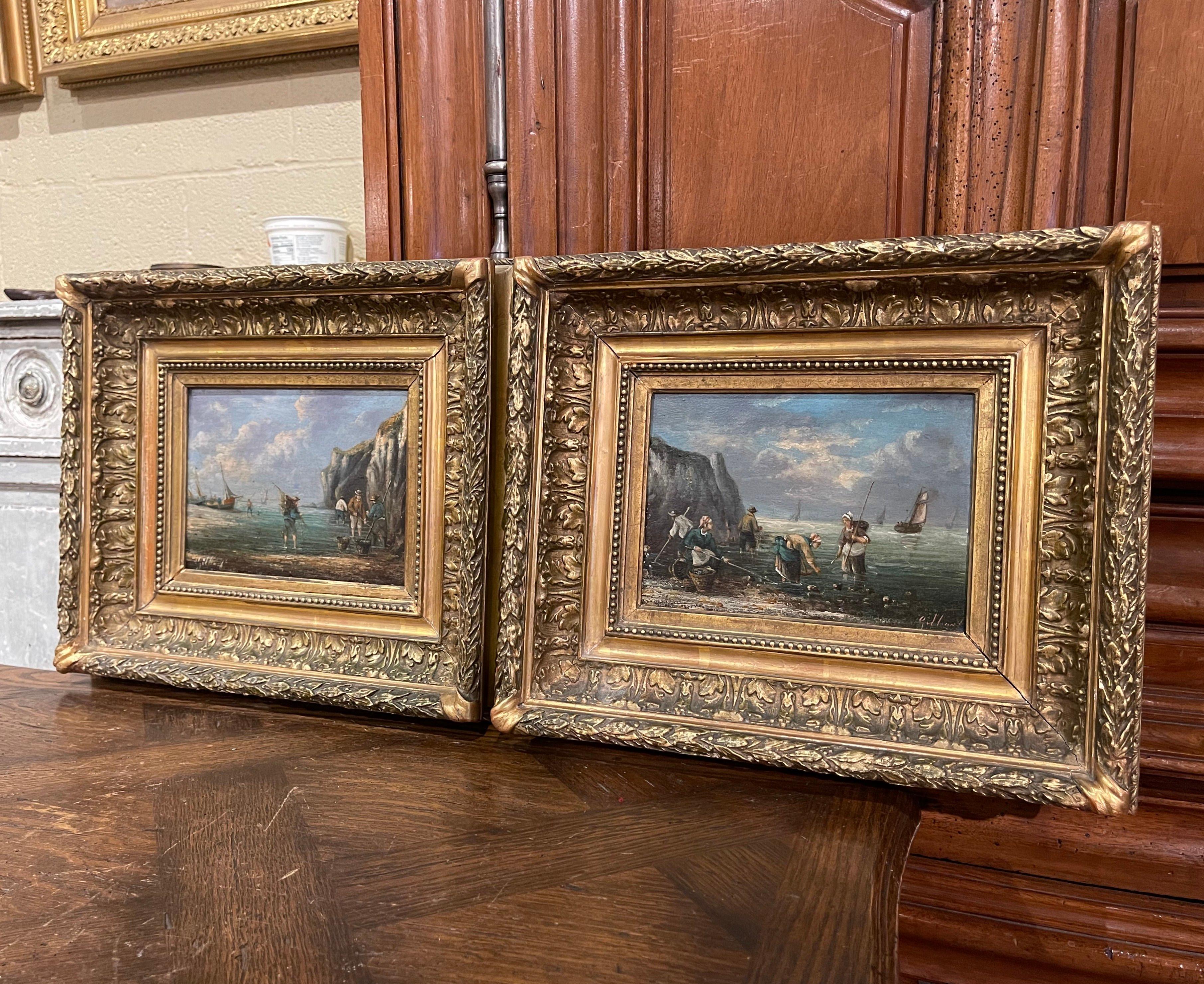 Decorate a wall with this elegant pair of antique paintings on board. Created in France circa 1860, and set in the original carved gilt wood frame, each hand painted artwork depict a beach scene on the coast of Brittany and featuring people fishing