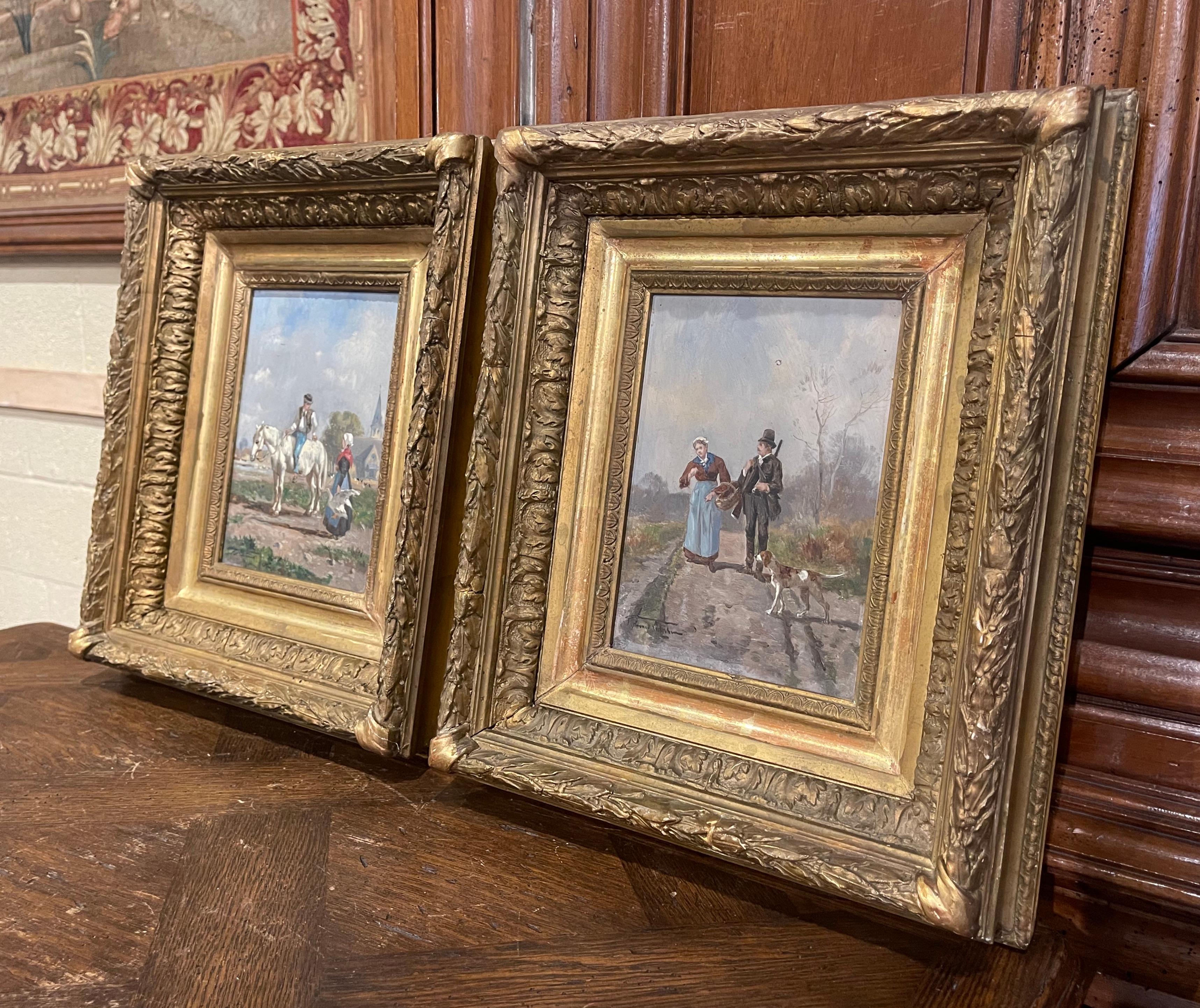 Decorate an office or study with this elegant pair of antique paintings. Crafted in France circa 1870, the artworks hand painted on board, are set inside the original beautiful carved gilt wood frames. Each colorful picture depicts a pastoral scene