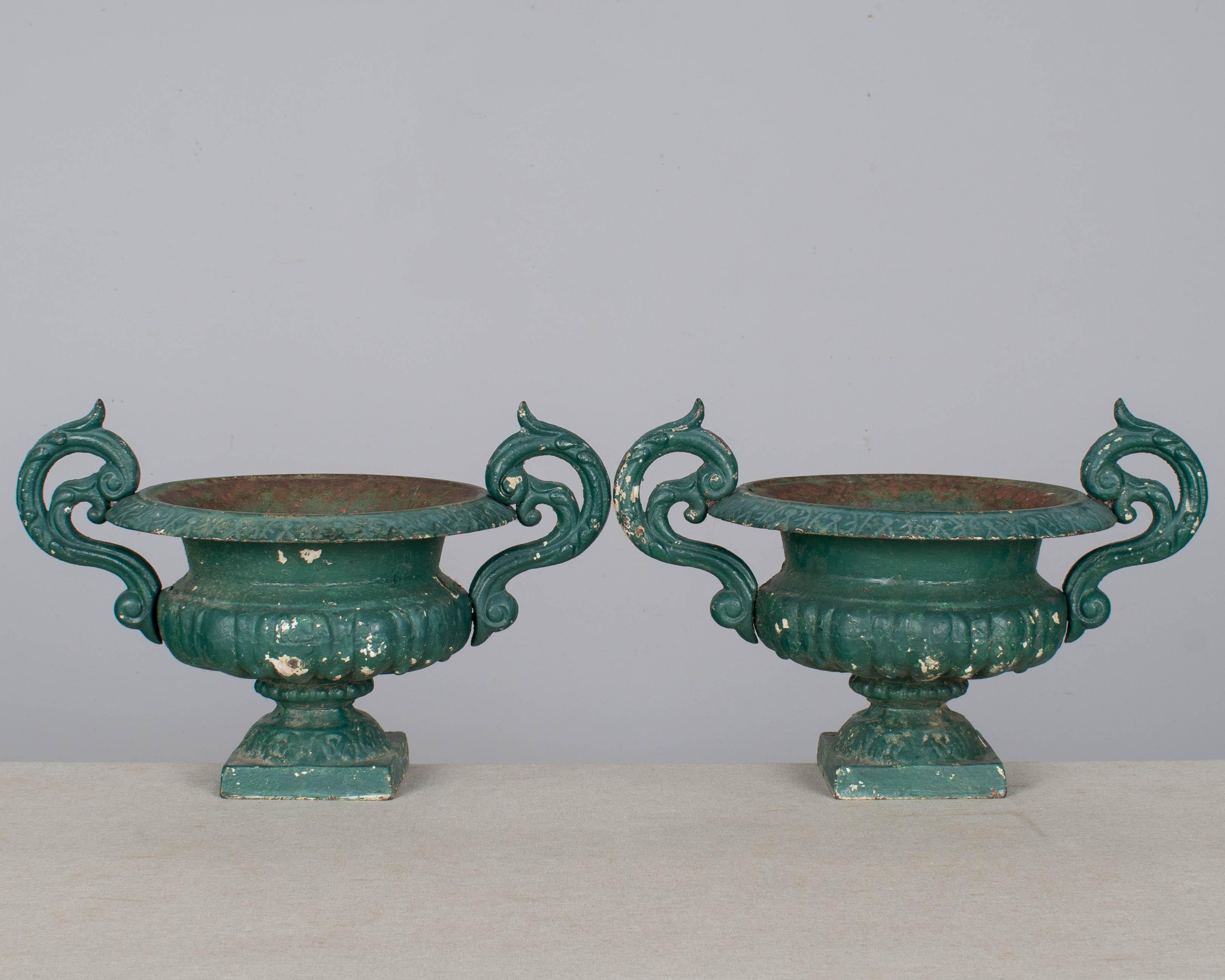 Beaux Arts Pair of 19th Century French Small Cast Iron Urns For Sale