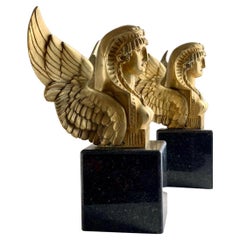 Pair of 19th Century French Solid Bronze Winged Sphinx on Marble Bases