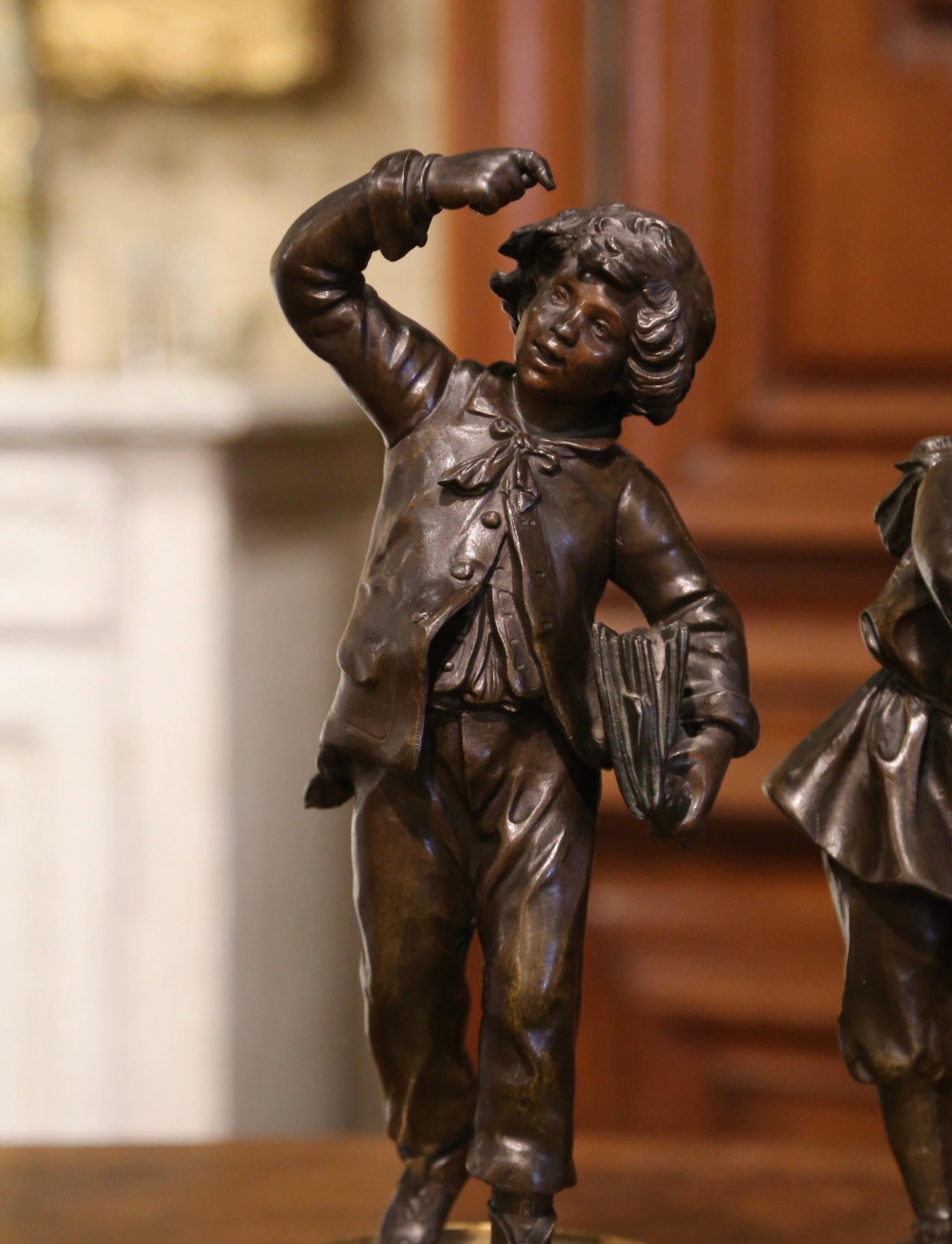 Patinated Pair of 19th Century French Spelter and Bronze Boy Figurative Sculptures For Sale