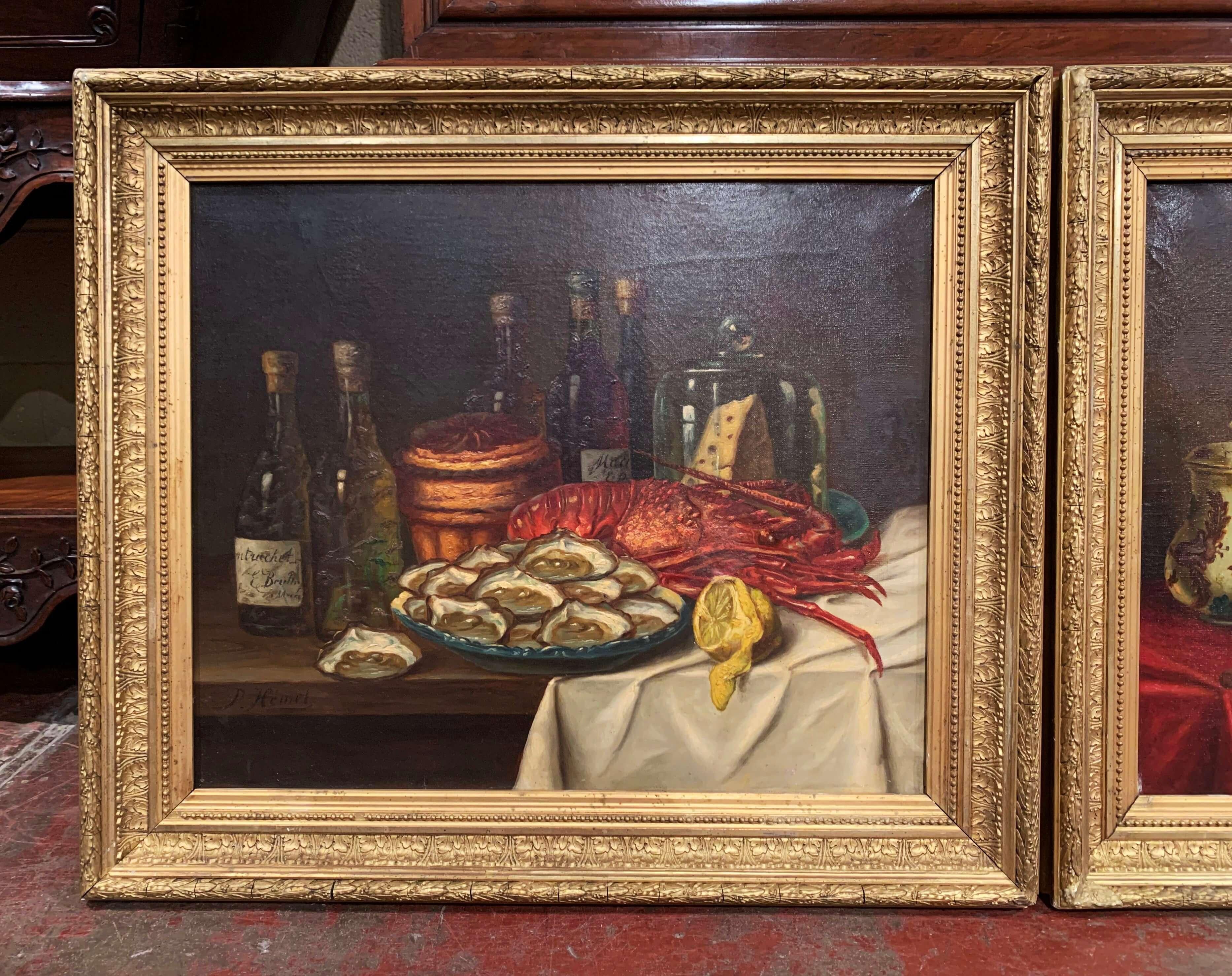 Invite vibrant color into your home with this traditional pair of antique still life paintings. The paintings were crafted in France circa 1880 and are set in ornate, carved gilt frames. Each canvas depicts 