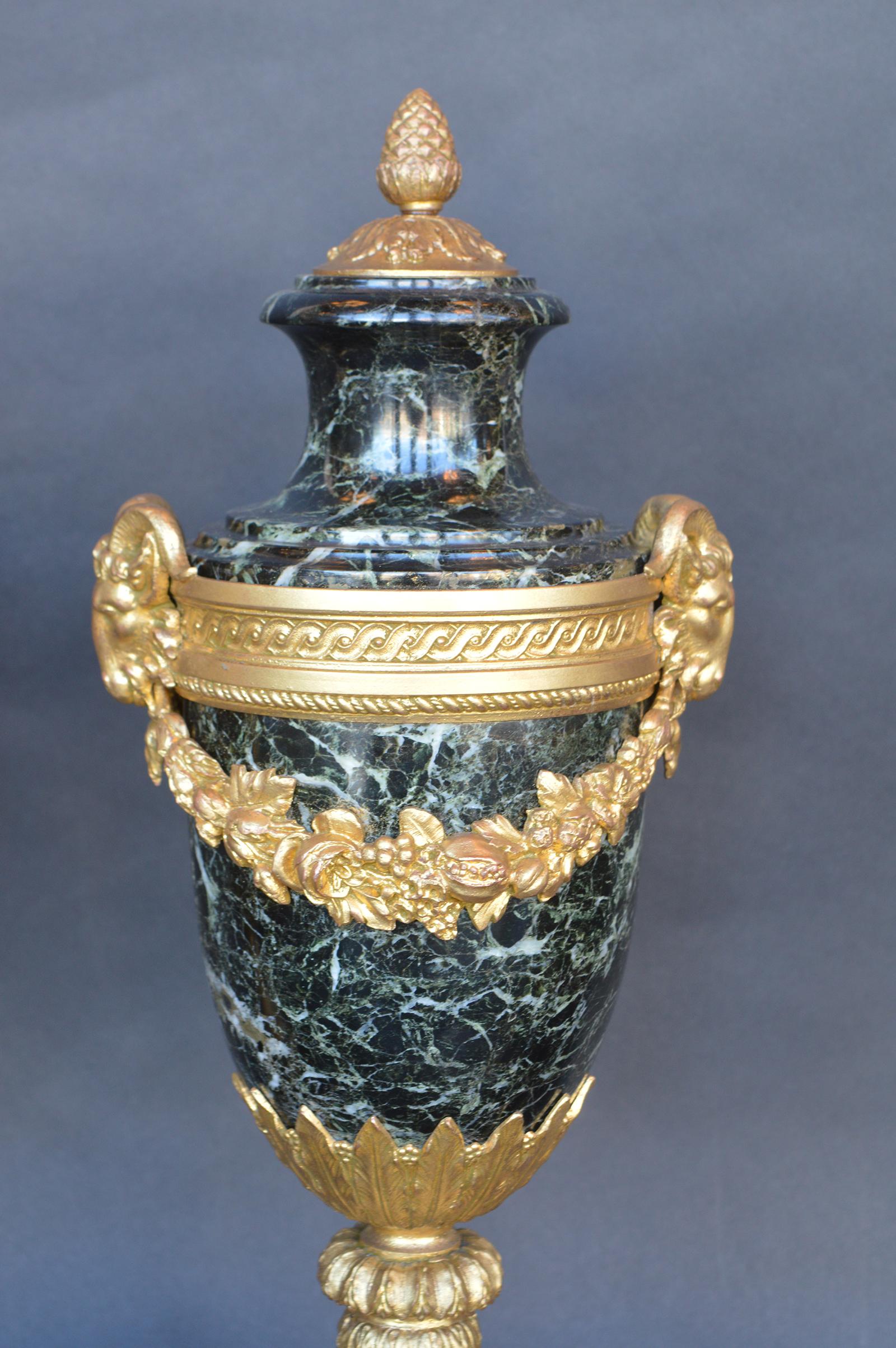 Pair of green marble and bronze urns, 19th century, French.